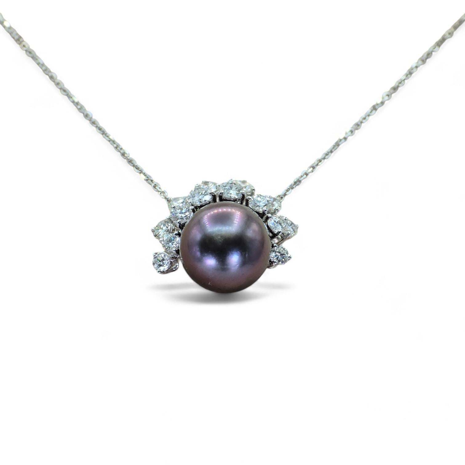 Colgante de perla negra de Tahití natural


Tipo de metal Oro Blanco 18K 750
Peso total del artículo: 9,85 gramos
Longitud: 18 pulgadas
1:
Peso del diamante natural: 2 qt.
Nº de diamantes: 14
Grado de Claridad del Diamante: VVS
Grado de Color del