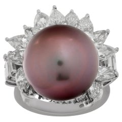 Tahitian Pearl (15 x 15.50mm) and Round and pear shape diamond ring in platinum