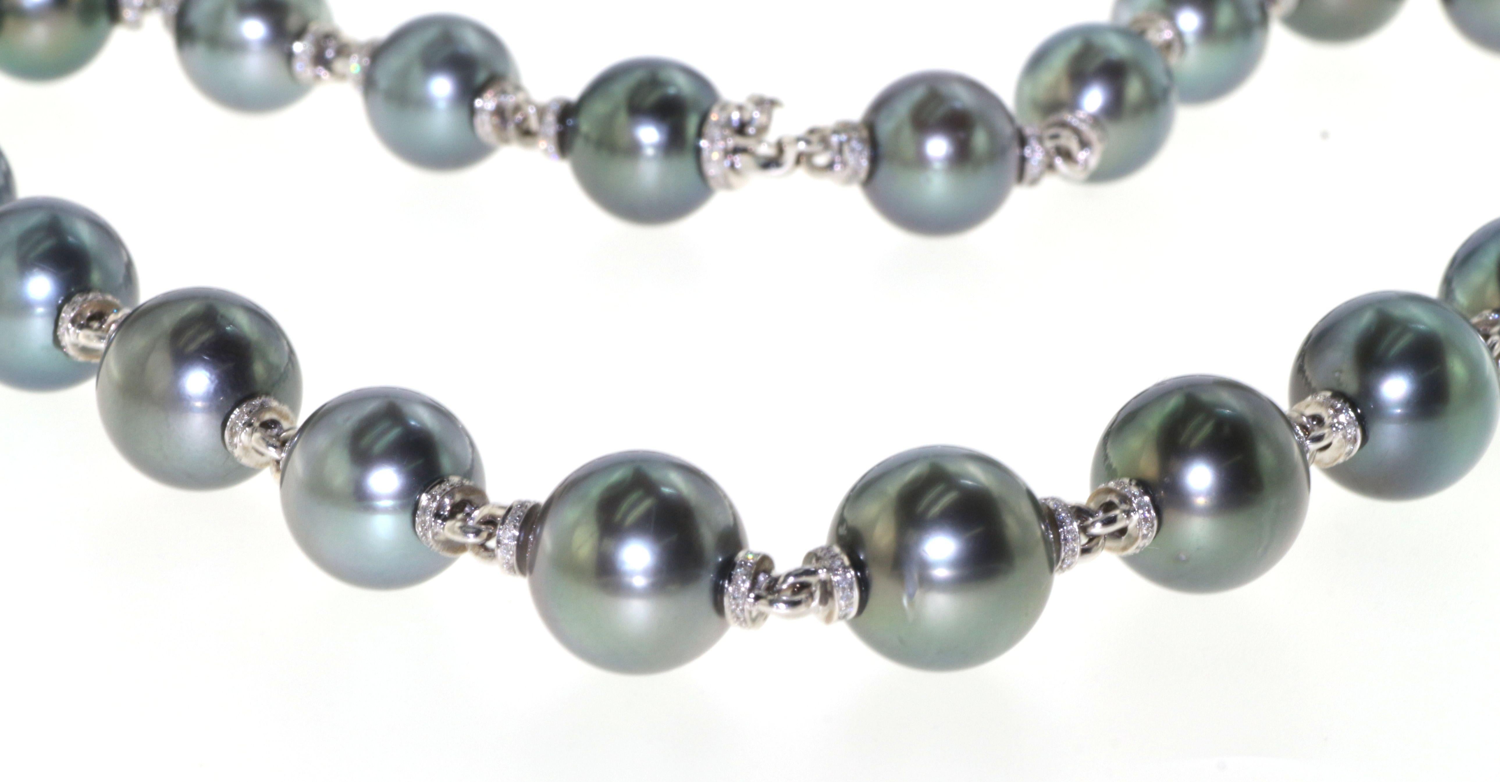 This unique custom made Large South Sea Tahitian 12.00-13.00 MM Pearl and diamond rondell necklace length is 16 inch. A great piece for your special someone. This Tahitian pearl necklace also have a matching bracelet, please visit our storefront and