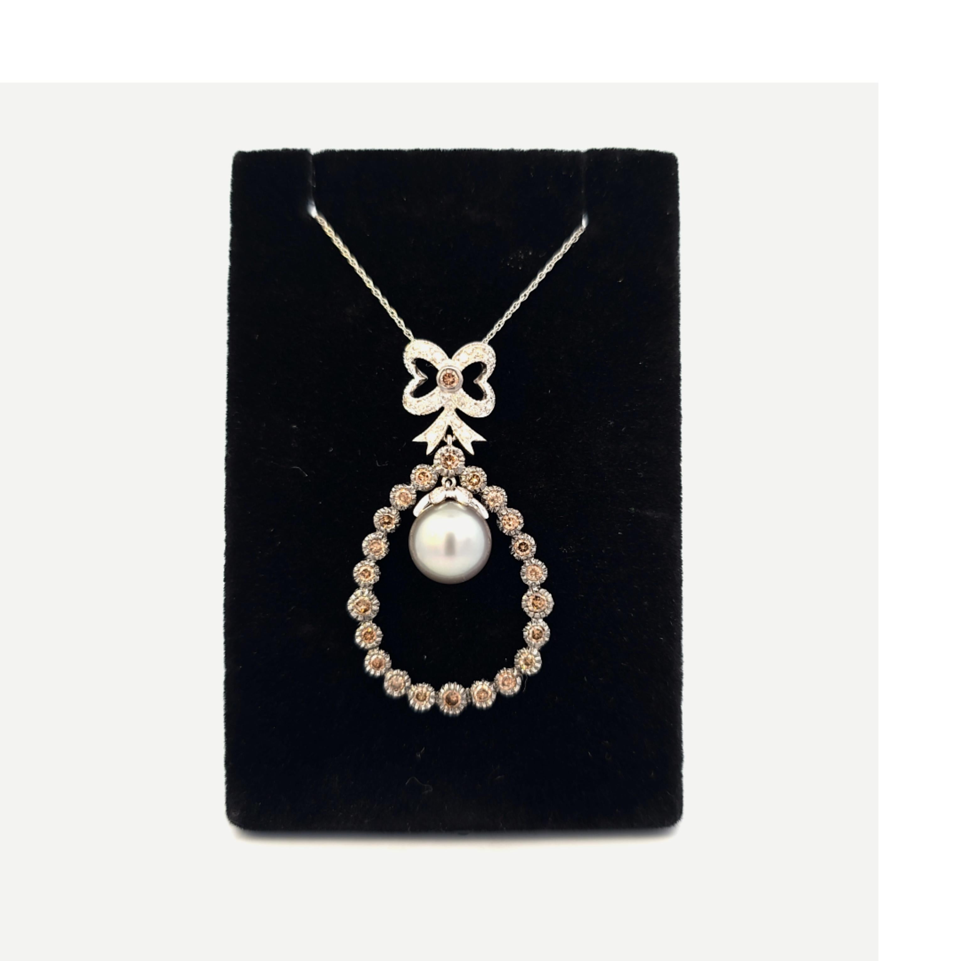 Such a beautiful necklace from the early 1900's!  10 karat white gold and natural color, Tahitian Pearl and brown diamond necklace