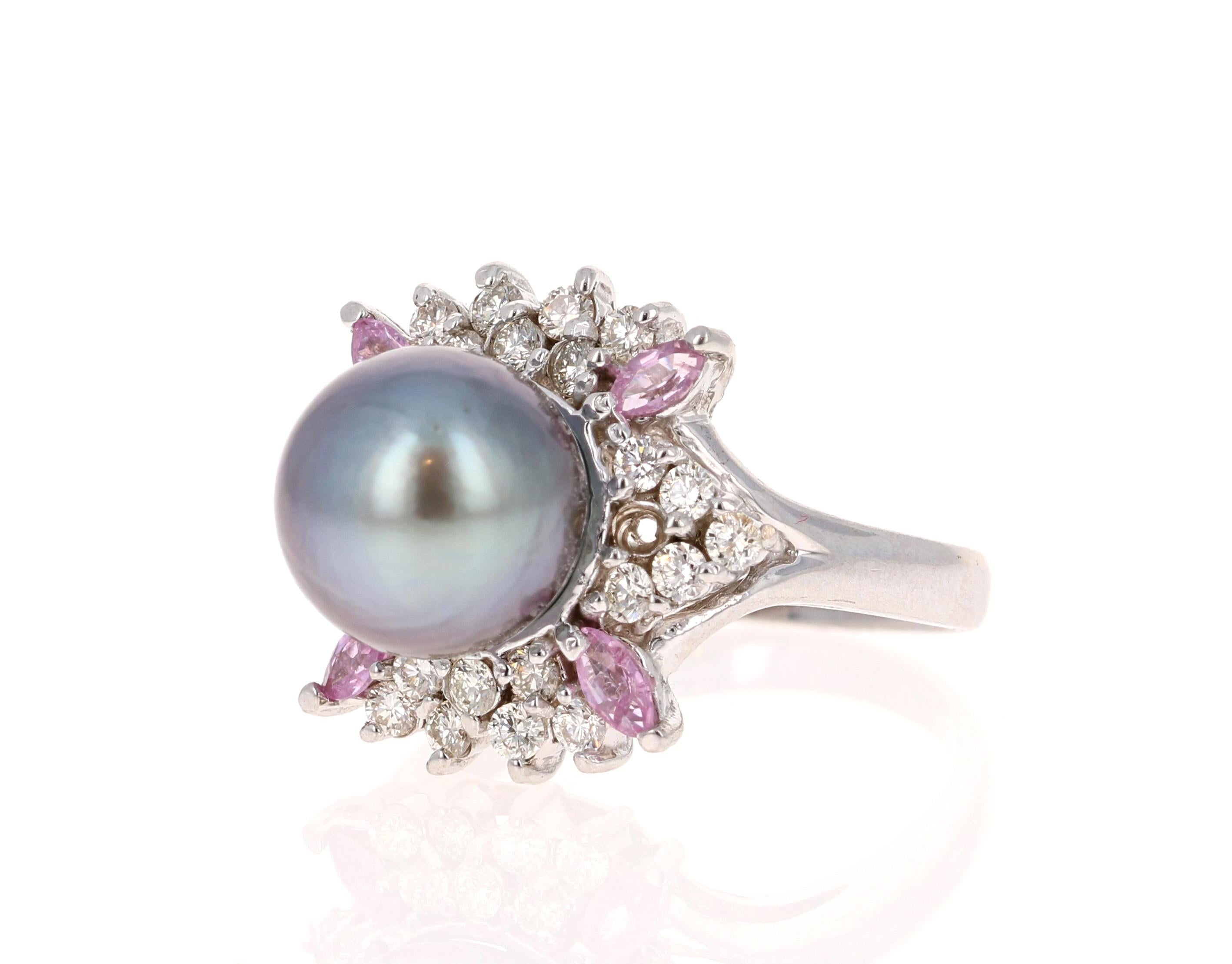 This beautiful flower like ring has a stunning 10mm Tahitian Pearl that is set in the center of the ring.  The pearl is surrounded by 28 Round Cut Diamonds that weigh 0.72 carats (Clarity:VS2 and Color:H)  and accented with 4 Marquise Cut Pink