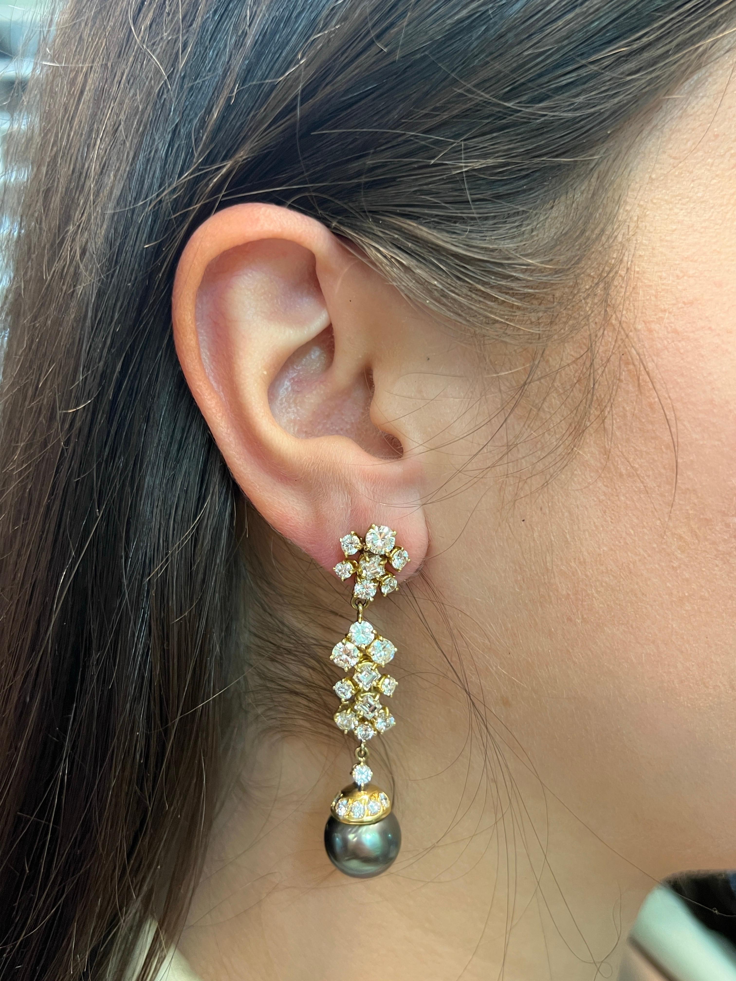 Tahitian Pearl and Diamond Earrings

Tahitian pearl earrings set with round-cut diamonds. 

Approximate Diamond Weight: 7 carats
Approximate Length: 2.25