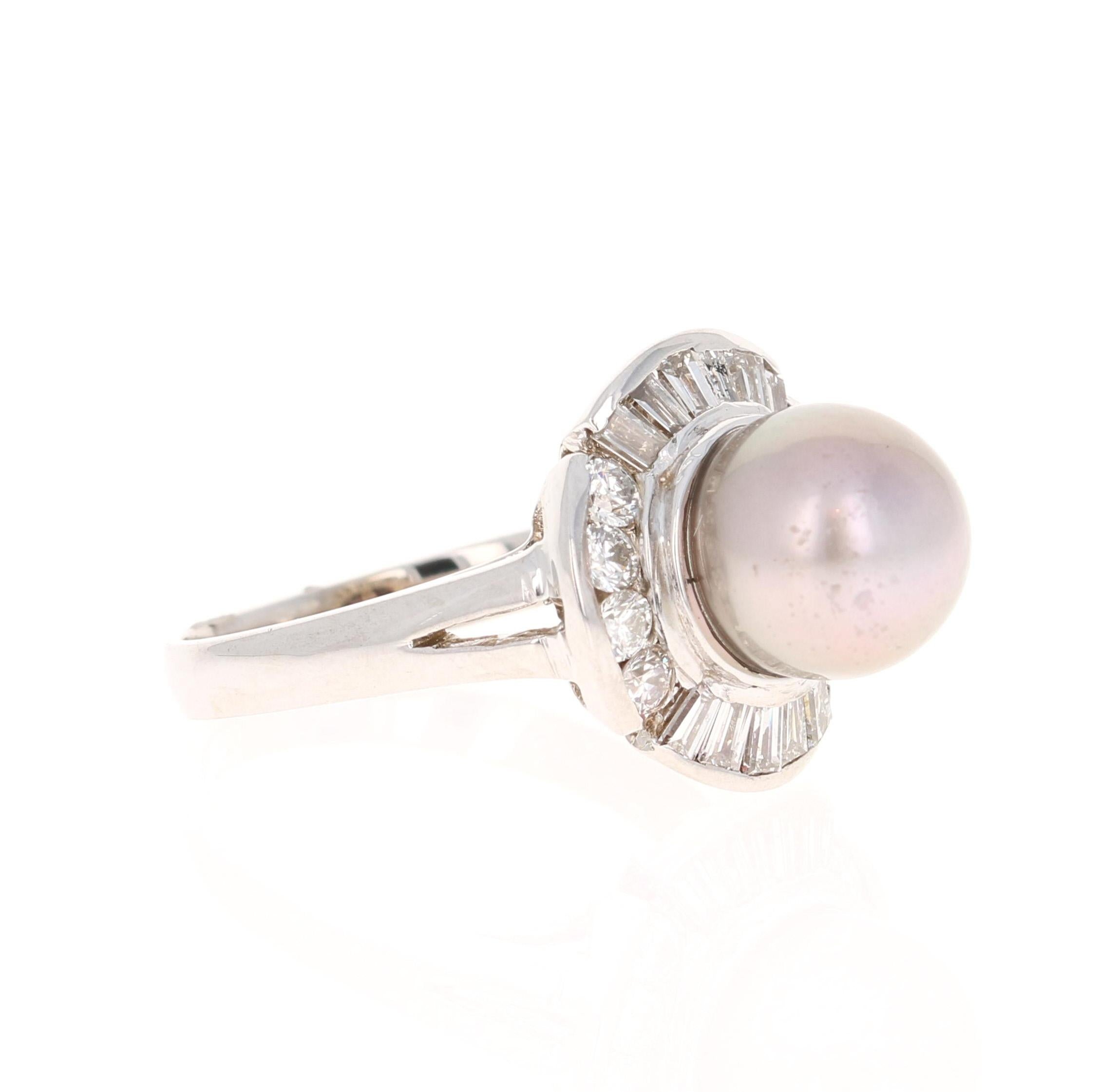 Tahitian Pearl Ring that has a 8mm Pearl and is surrounded by 12 Baguette Cut Diamonds that weigh 0.45 carats. (Clarity: VS2, Color: F)
The ring is made in 14K White Gold and weigh approximately 4.7 grams.   
The ring is a size 7 and can be resized