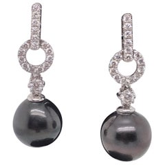 Boucles d'oreilles pendantes perle de Tahiti diamant 0.61 carat or blanc 18 carats 11-12MM 