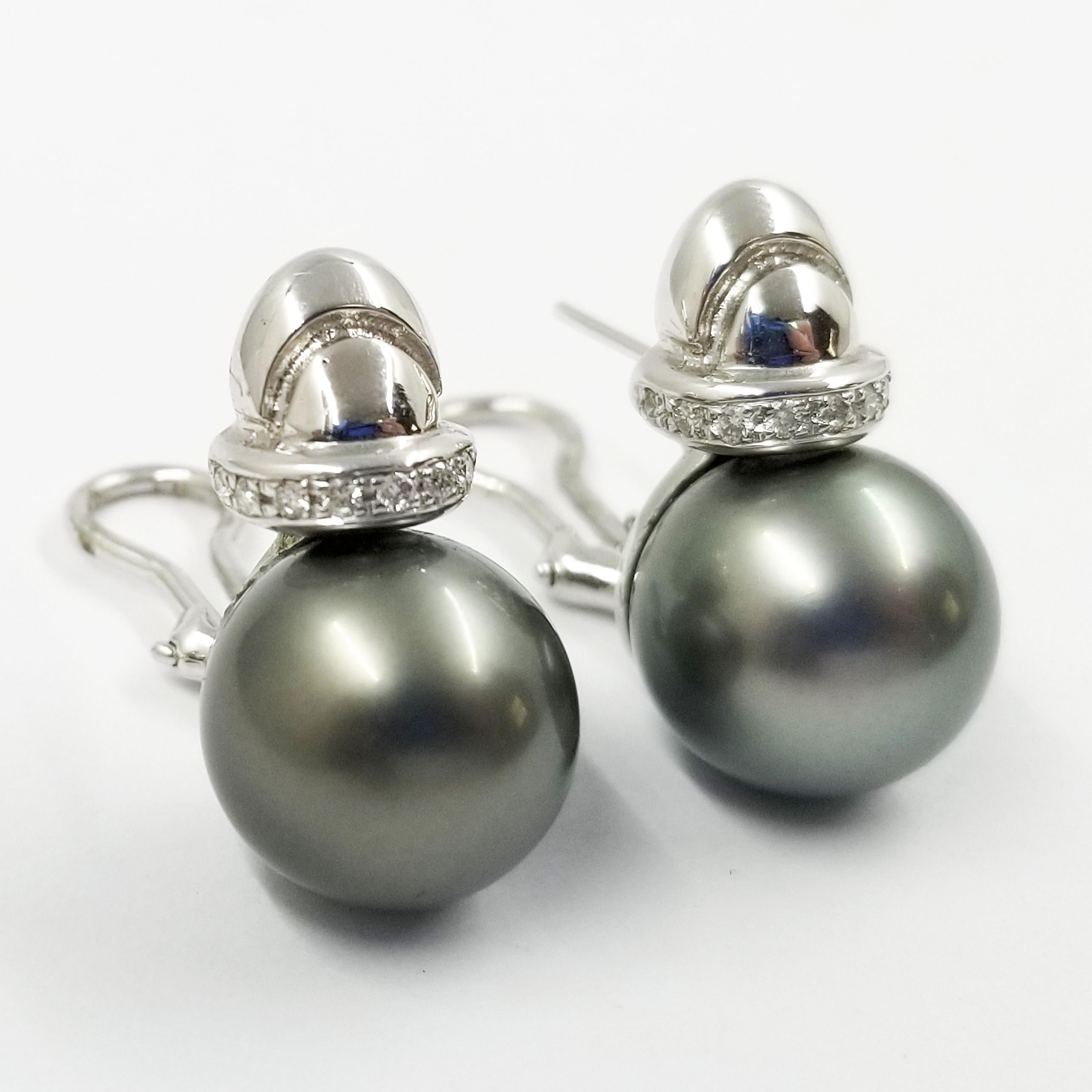 14 Karat White Gold Cultured Pearl Earrings Featuring a Pair of 13.5mm Gray South Sea Pearls & 18 Round Diamonds Totaling Approximately 0.24 Carats. The Attachment is a Pierced Post with Omega Clip Back for Extra Support.