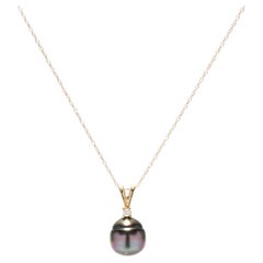 Collier pendentif perles de Tahiti, or jaune 10 carats et diamants