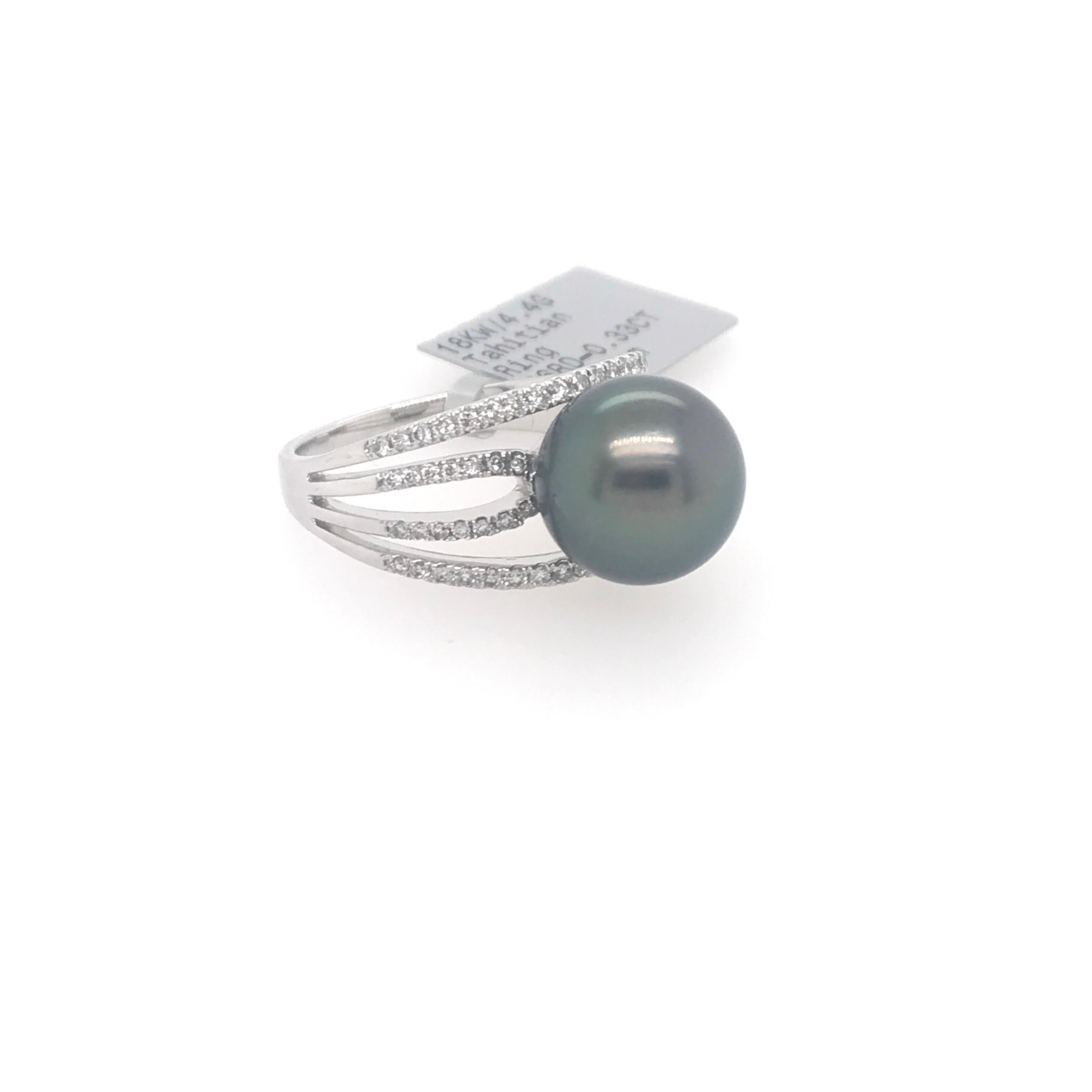 18K White Gold ring featuring one center Tahitian Pearl measuring 10-11 mm flanked with 4 rows of 66 round brilliants weighing 0.33 carats. 