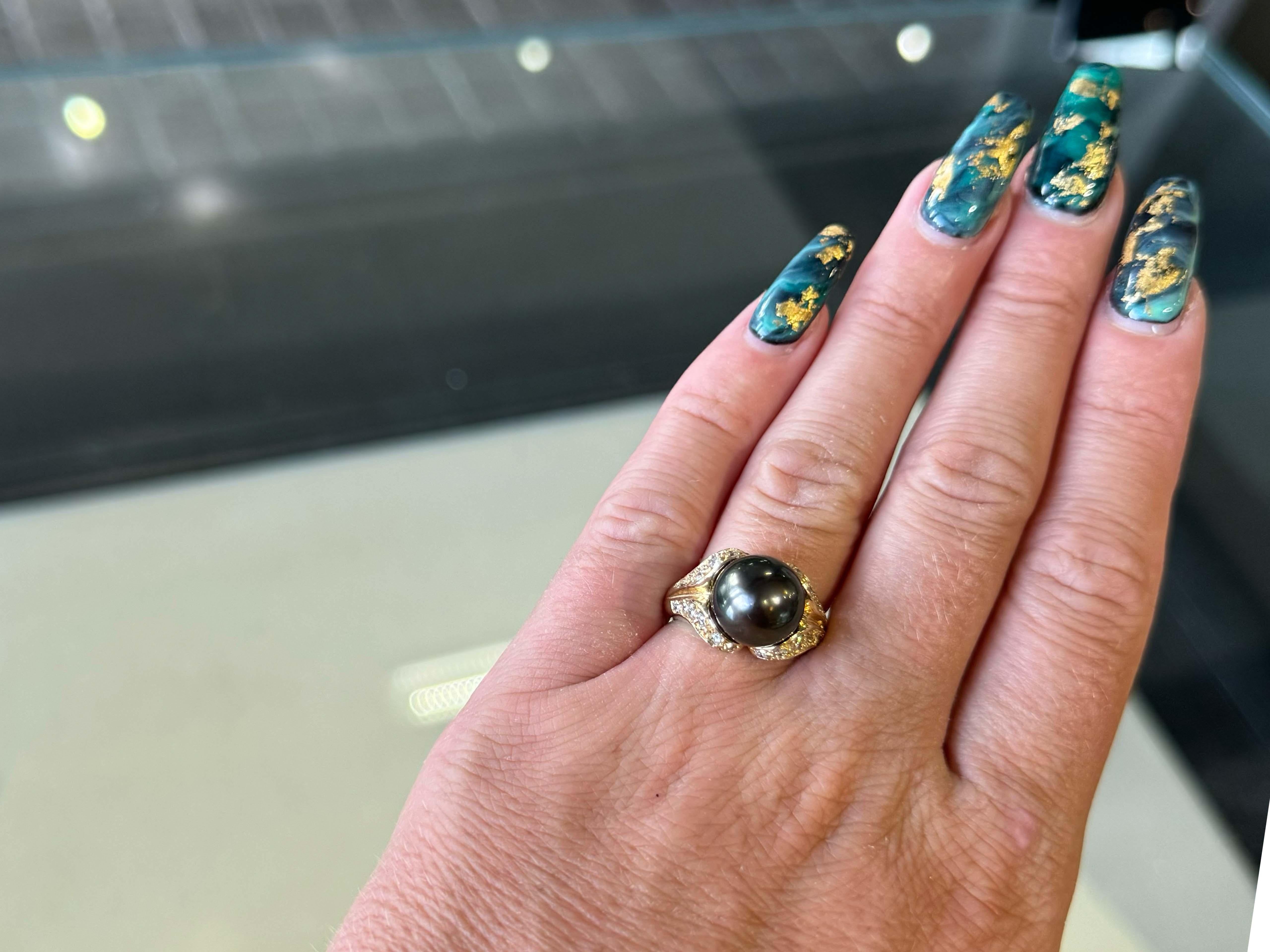 Specifications:

Metal: 14K Yellow Gold

Tahitian Pearl Diameter: 10.8 mm

Diamond Count: 24

Diamond Color: G-J

Diamond Clarity: VS2-I1

Diamond Carat Weight: 0.45 carats

Total Weight: 7.9 Grams

Ring Size: 7

Stamped: 