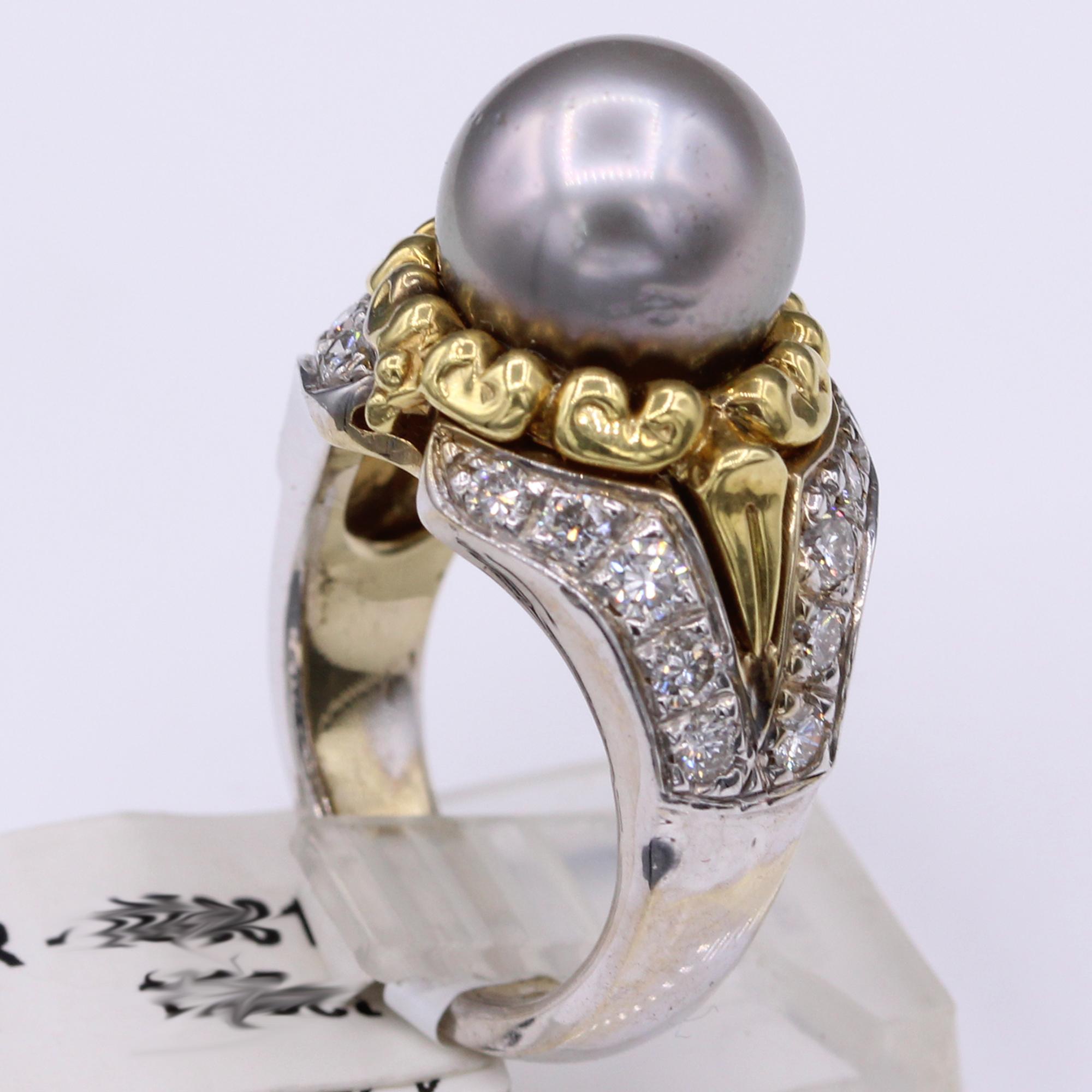 Vintage Grey Tahitian Pearl Ring
with Natural Diamonds
Pre owned- as new condition
18K Gold  approx 14 grams
Hight Quality - well made 
Two tone Yellow & White Gold 
Tahitian Pearl size 11 mm nice good luster.
Natural Brilliant Diamonds Approx 1.30