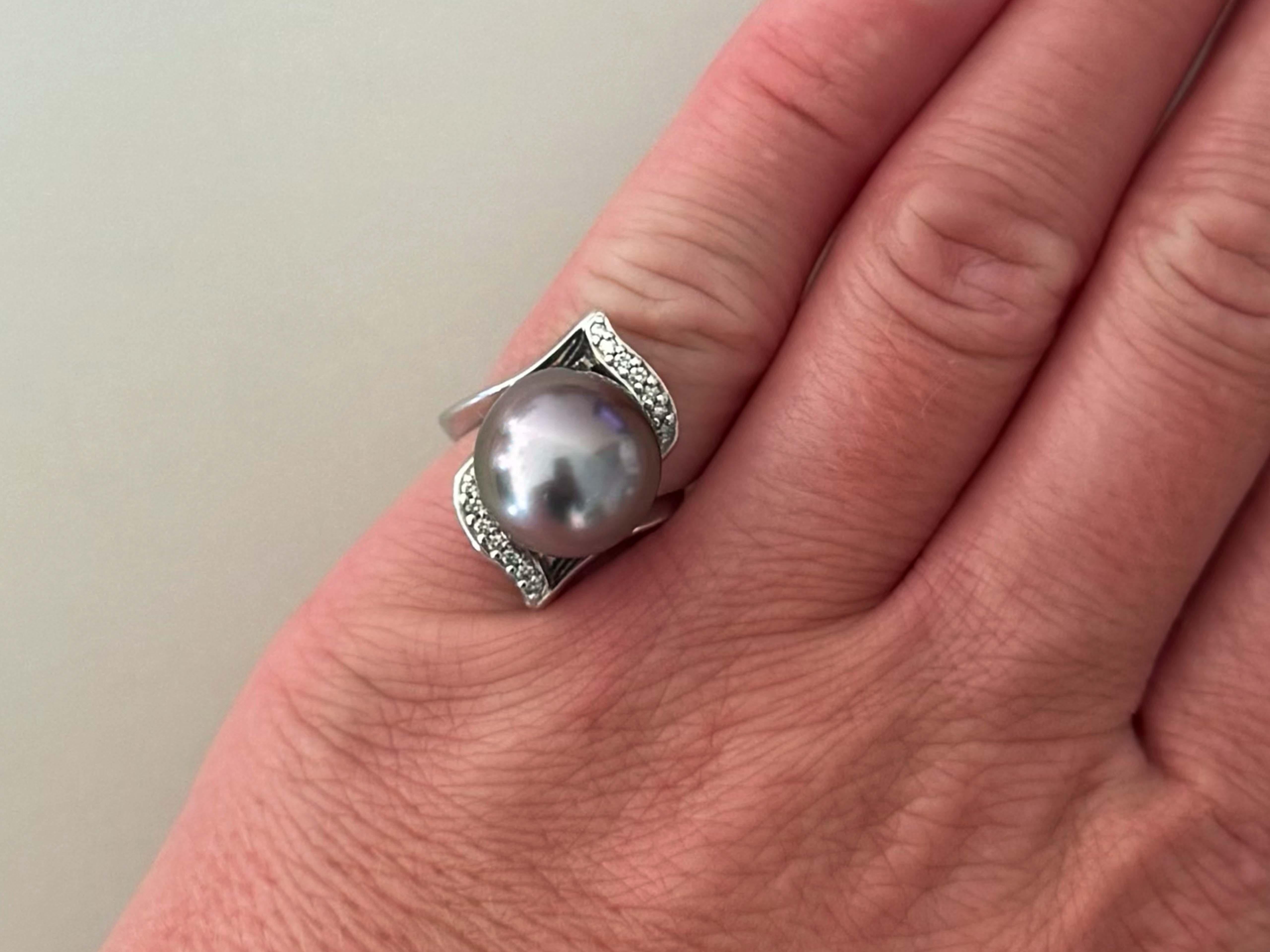 Specifications:

Metal: 14K White Gold

Ring Tahitian Pearl Diameter: 13 mm
​
​Earring Tahitian Pearl Diameter: 9.3 mm

Diamond Count: 14 on ring, + 28 on earrings= 42 diamonds total

Diamond Color: G-J

Diamond Clarity: SI1-SI2

Diamond Carat