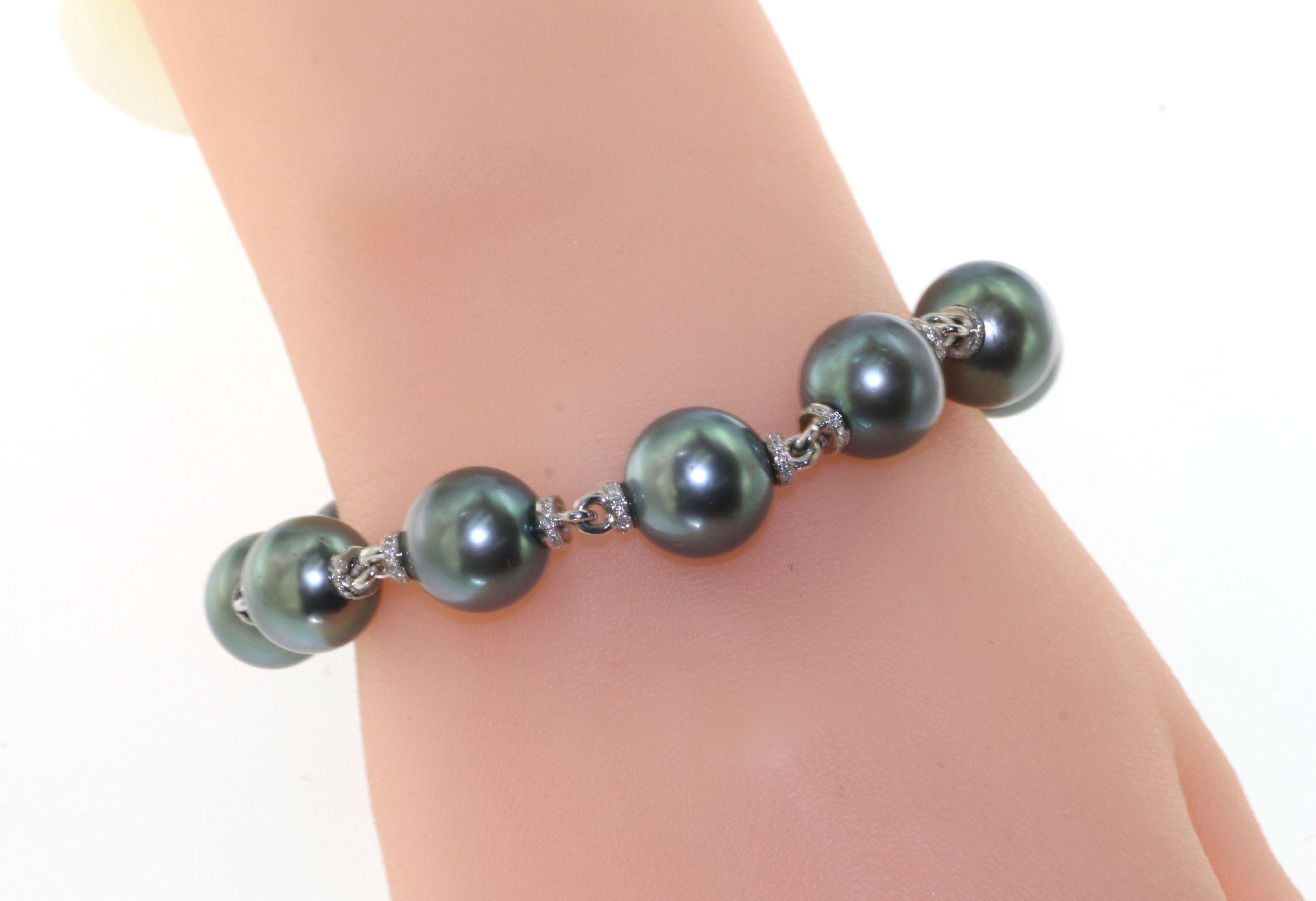 This unique custom made Large South Sea Tahitian 12.00-13.00 MM Pearl and diamond rondell bracelet length is 8.5 inch. A great piece for your special someone. This Tahitian pearl bracelet also have a matching necklace, please visit our storefront to