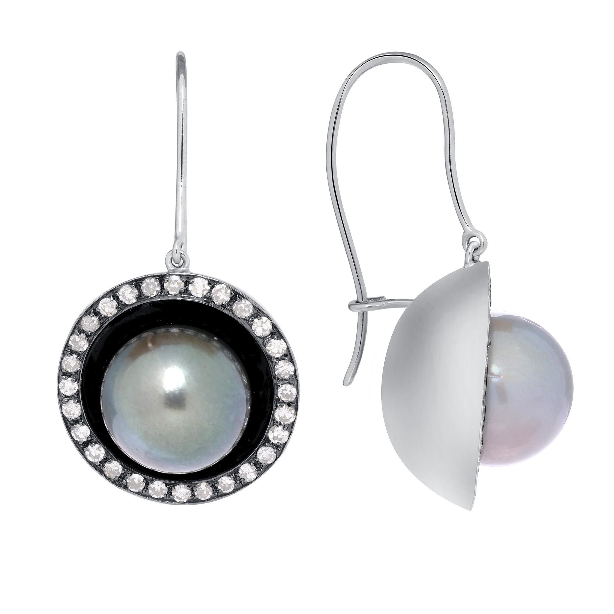 Tahitian Pearl, Diamond, White Gold Dangle Earrings, In Stock. These dangle earrings are 1.04-carat total weight black pearls surrounded by single-cut diamonds. The diamonds are 1.04-carat total weight, SI1-G, and are all natural diamonds. The black
