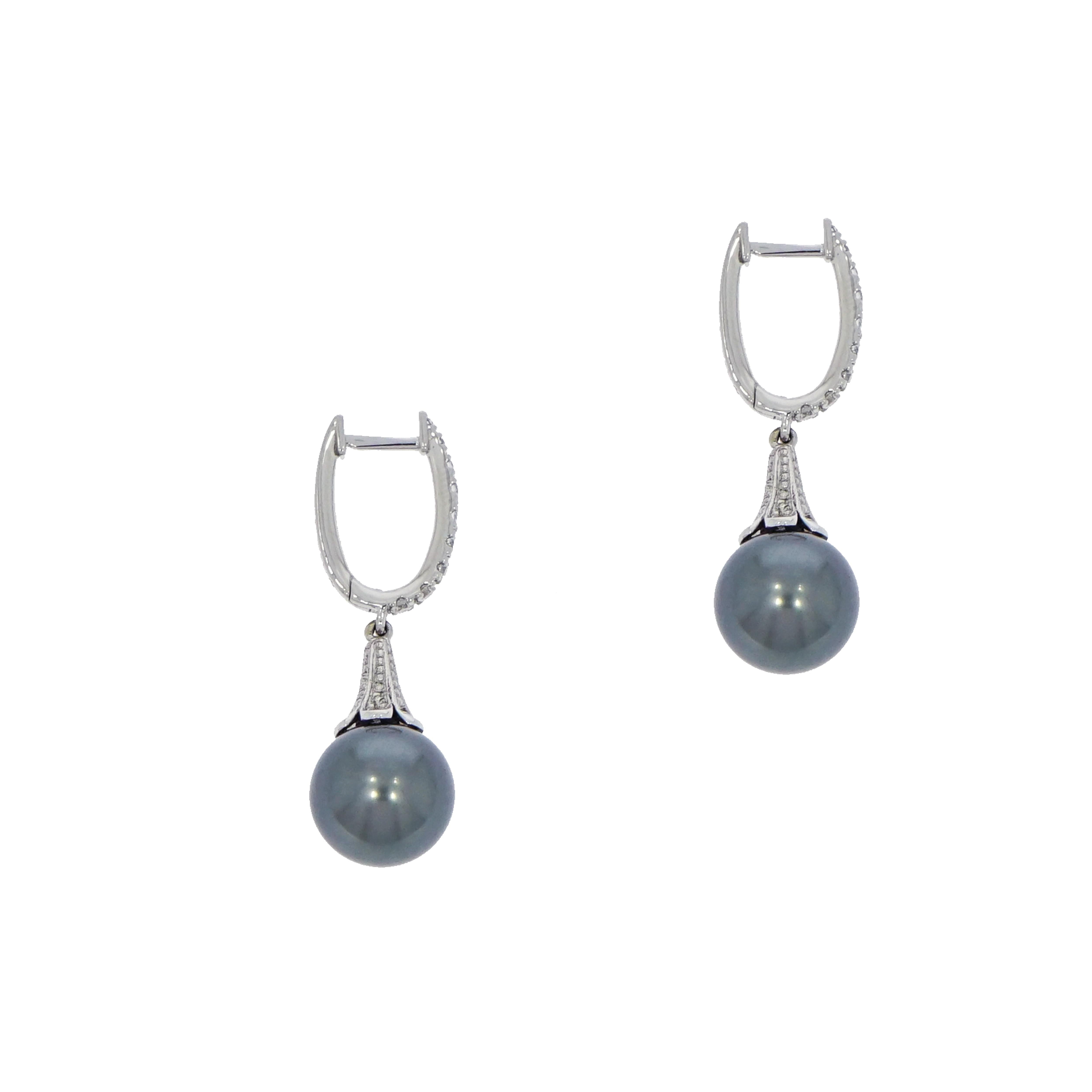 
Handcrafted in Platinum and adorned with 30 round diamonds totaling approximately 0.57 ct. this beautiful Tahitian Pearl Drop Earrings becomes an eye-catching and wearable heirloom-quality jewelry featuring a pair of 10.5 -11mm Peacock Tahitian