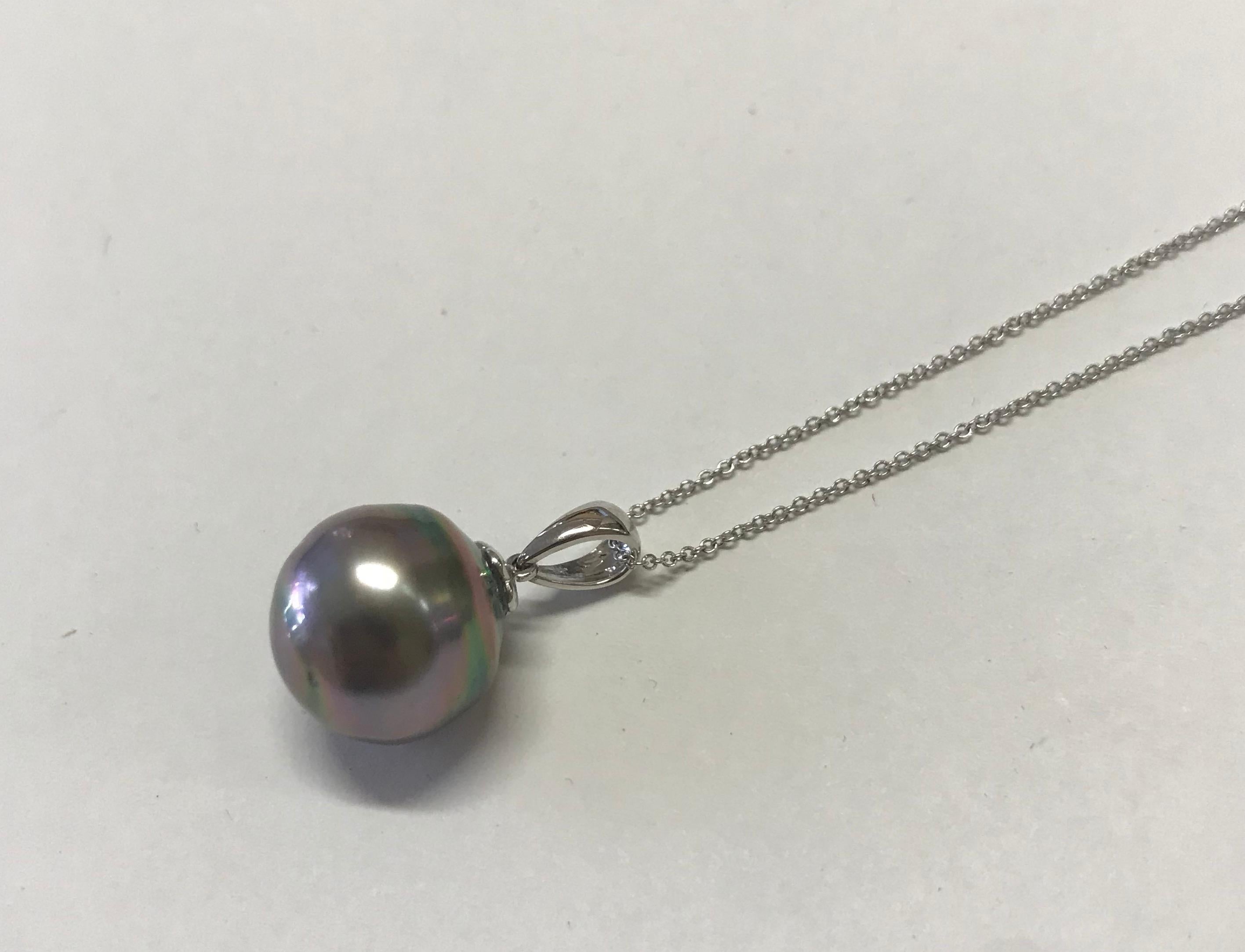 Material: 18K White Gold
Center Stone Details: Tahitian Pearl
Chain: 18 inches

Fine one-of-a-kind craftsmanship meets incredible quality in this breathtaking piece of jewelry.

All Alberto pieces are made in the U.S.A and include a lifetime