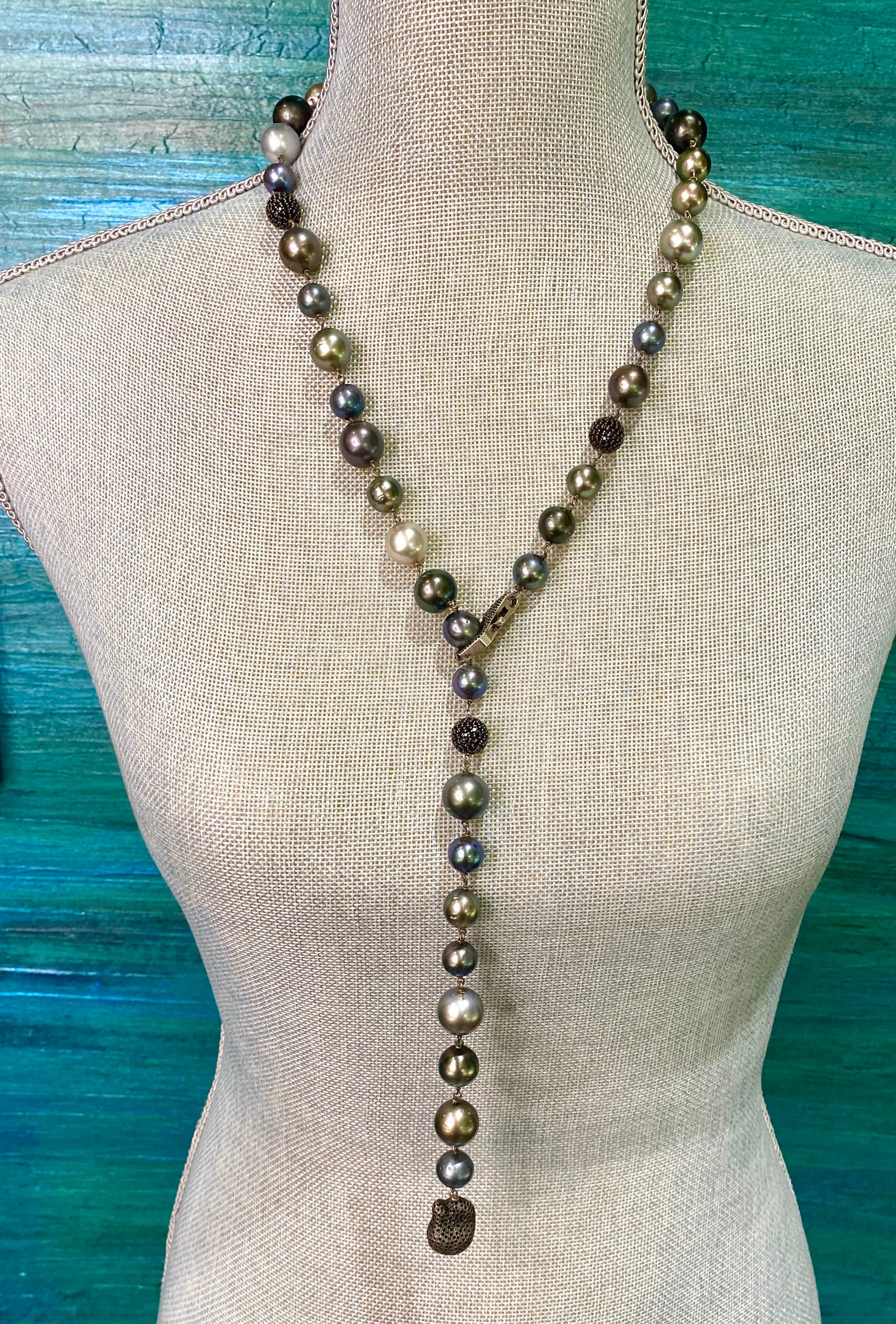 A modern take on classic Tahitian pearls!  These stunning, naturally colored Tahitian pearls are mostly round and feature almost every color that is available in Tahitian pearls.  They are 10-14mm in size and feature sparkling black spinel accent