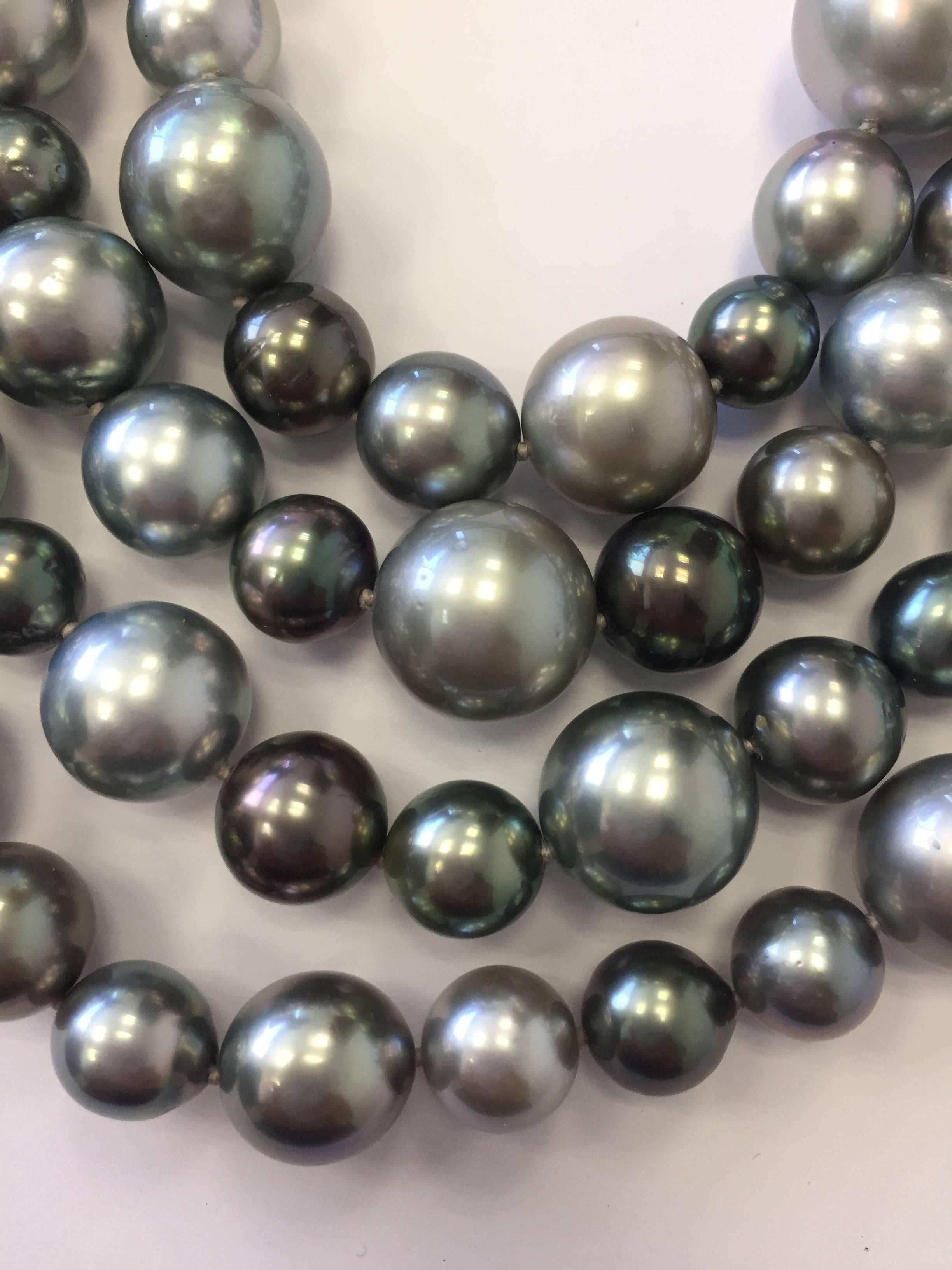 Gorgeous Tahitian pearls with beautiful luster in this 4 tiered necklace in 18k white gold.  Sophisticated and timeless, these pearls will be a great addition to any collection!