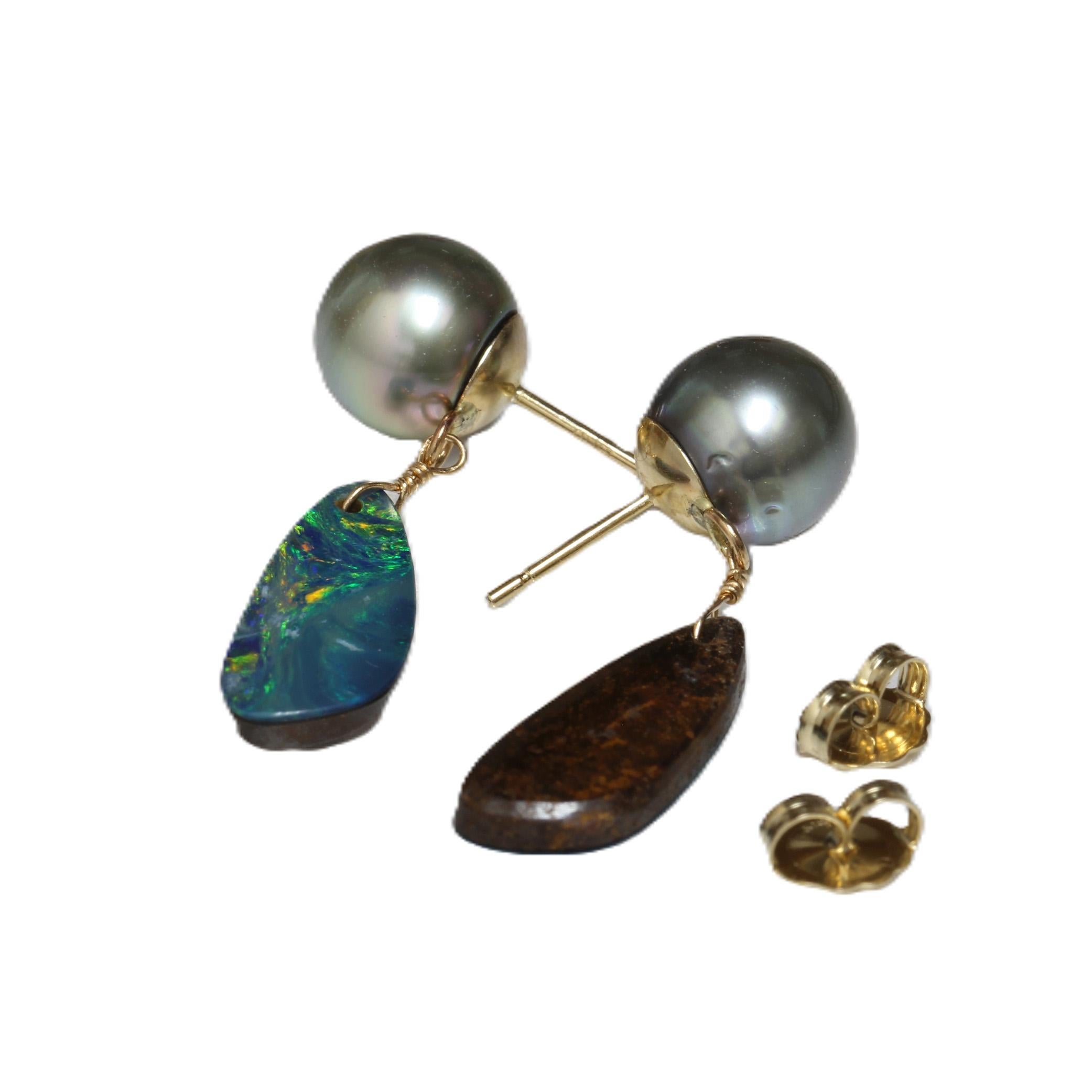 Origin: French Polynesia
Pearl Type: Tahitian Pearls
Pearl Size: 9.0 - 9.5 mm
Pearl Color: Natural Turquoise Green
Pearl Shape: Round
Pearl Surface: AAA
Pearl Luster: AAA Gem
Pearl Nacre: Top
Opal: Oval Shape
Length:	About 30 mm
Gold:	14kt
