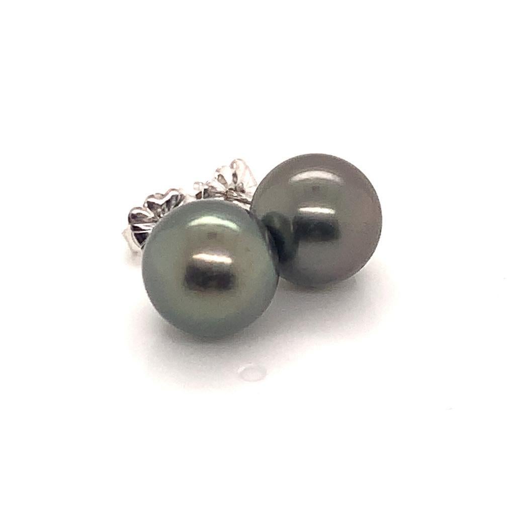 Fine Quality Tahitian Pearl Stud Earrings 14k White Gold 9.85 mm Certified $890 913502

This is a One of a Kind Unique Custom Made Glamorous Piece of Jewelry!

Nothing says, “I Love you” more than Diamonds and Pearls!

This item has been Certified,