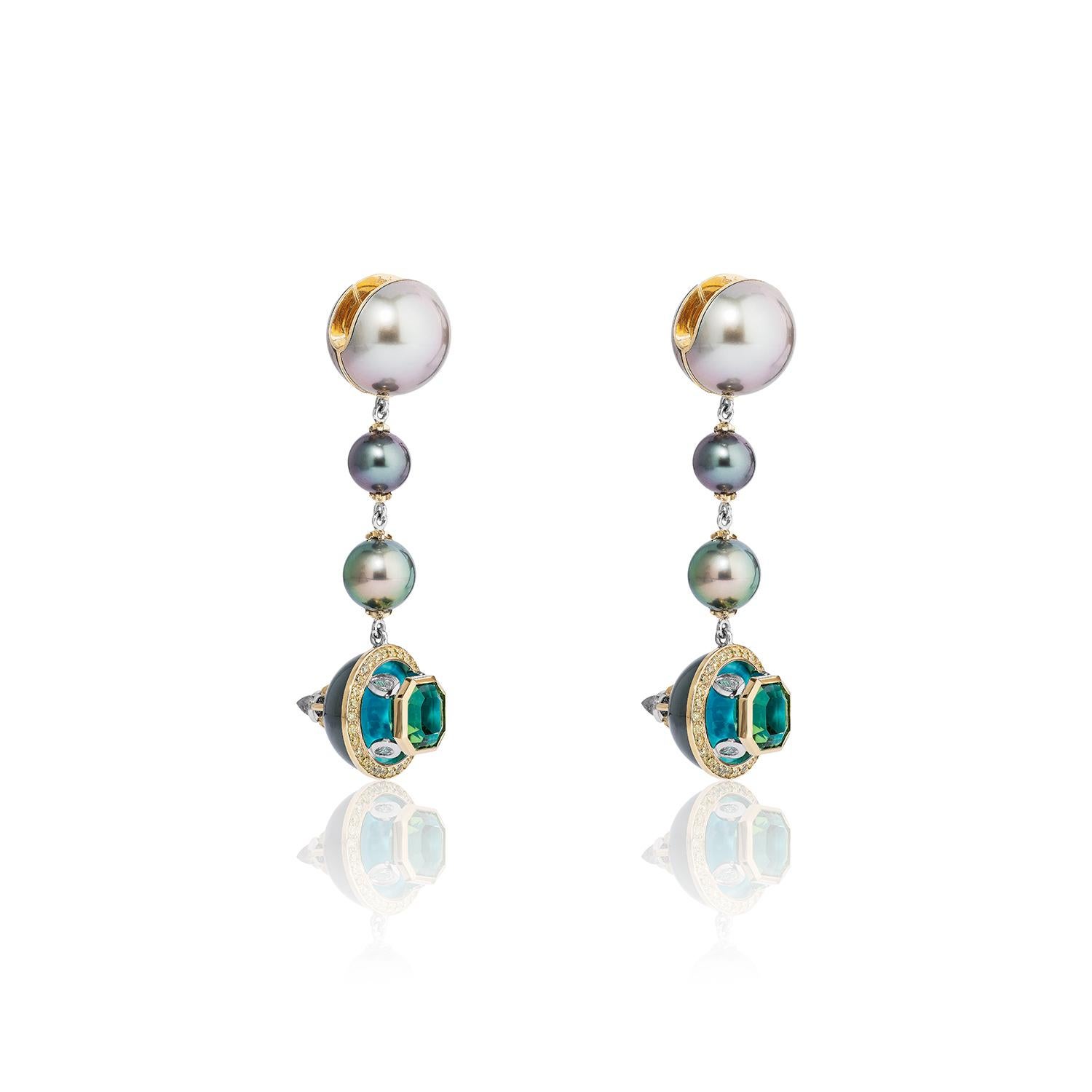 The Kalaimaia Earrings. Handmade in 18k yellow gold and Platinum with an exceptional 16mm Tahitian pearl carved in half. Each hemisphere is lined with Nacozari Turquoise, trimmed with a ring of pave set fancy yellow diamonds and suspended below