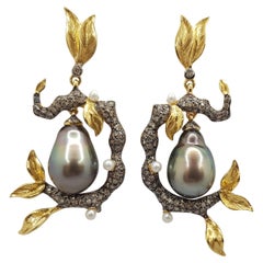 Boucles d'oreilles en or 18 carats avec perles de Tahiti et diamants bruns