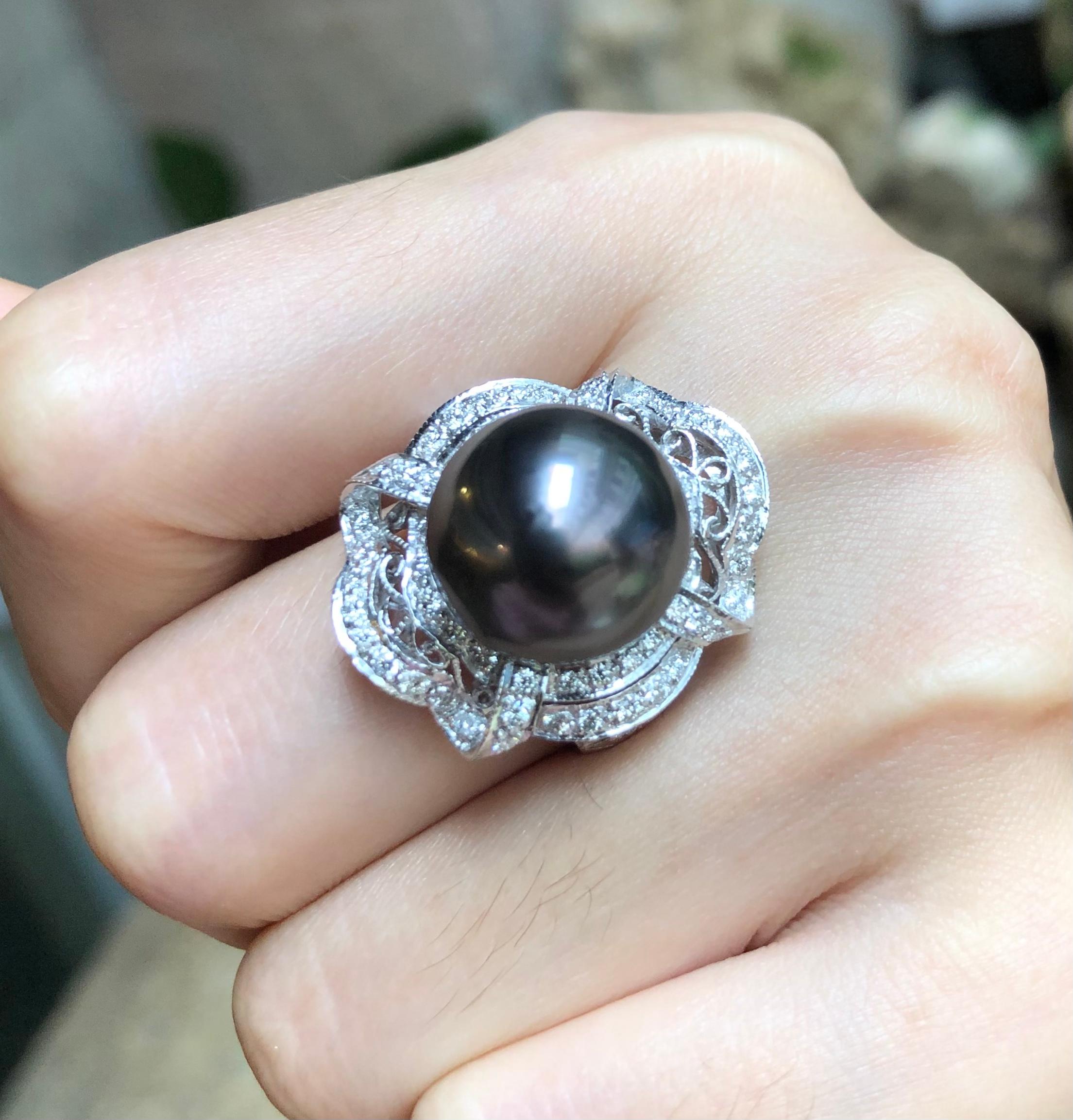 South Sea Pearl with Diamond 0.80 carat Ring set in 18 Karat White Gold Settings

Width:  2.3 cm 
Length: 2.5 cm
Ring Size: 55
Total Weight: 11.47 grams

