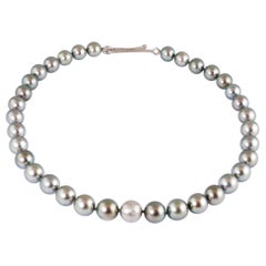 Tahitian Southsea Grey Pearls with Handmade Platinum diamond set Ball