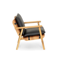 Teak Armchair with Black Leather Cushions and Slotted Backrest – Tai Collection