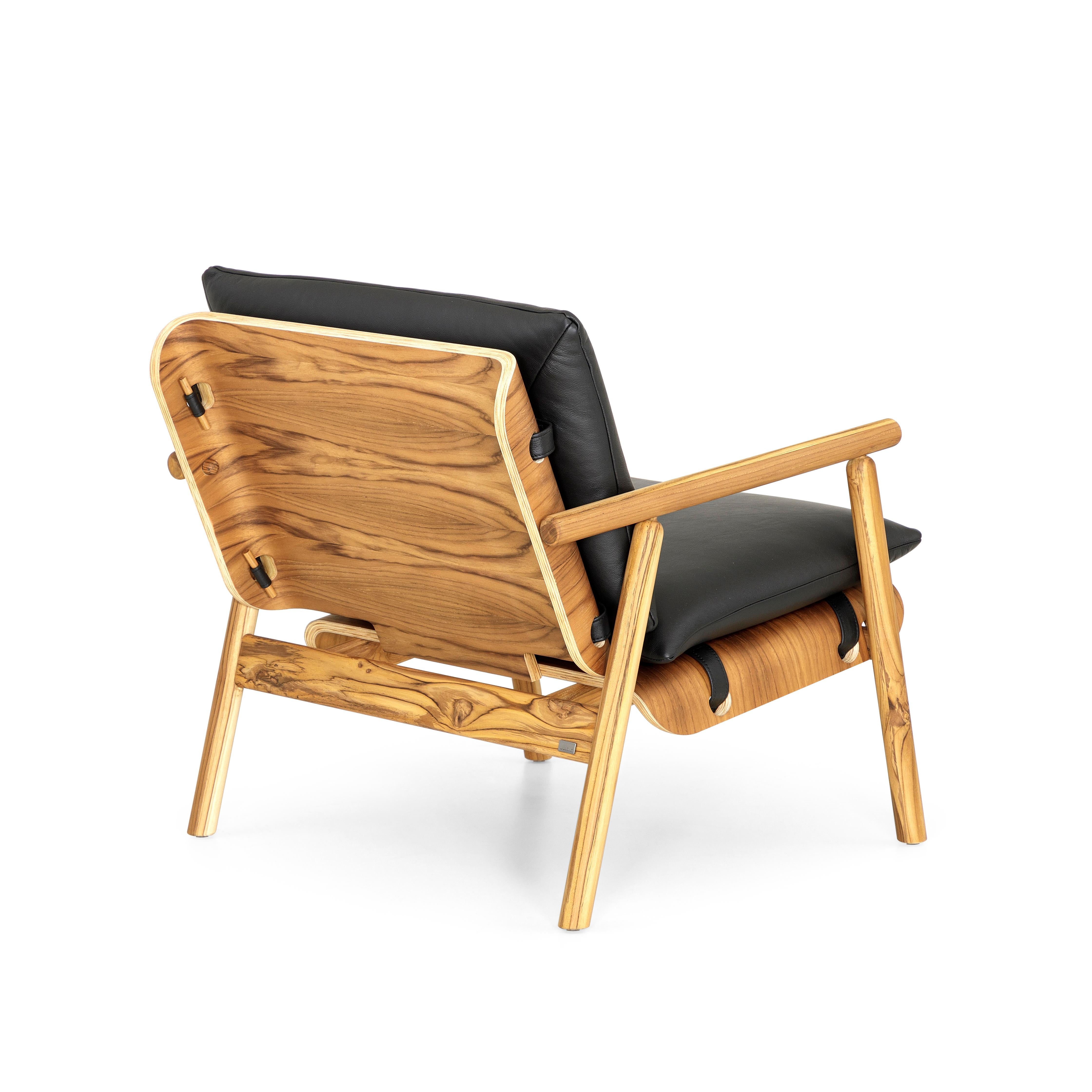 Brazilian Tai Armchair in Teak Wood Finish with Black Leather Cushions For Sale
