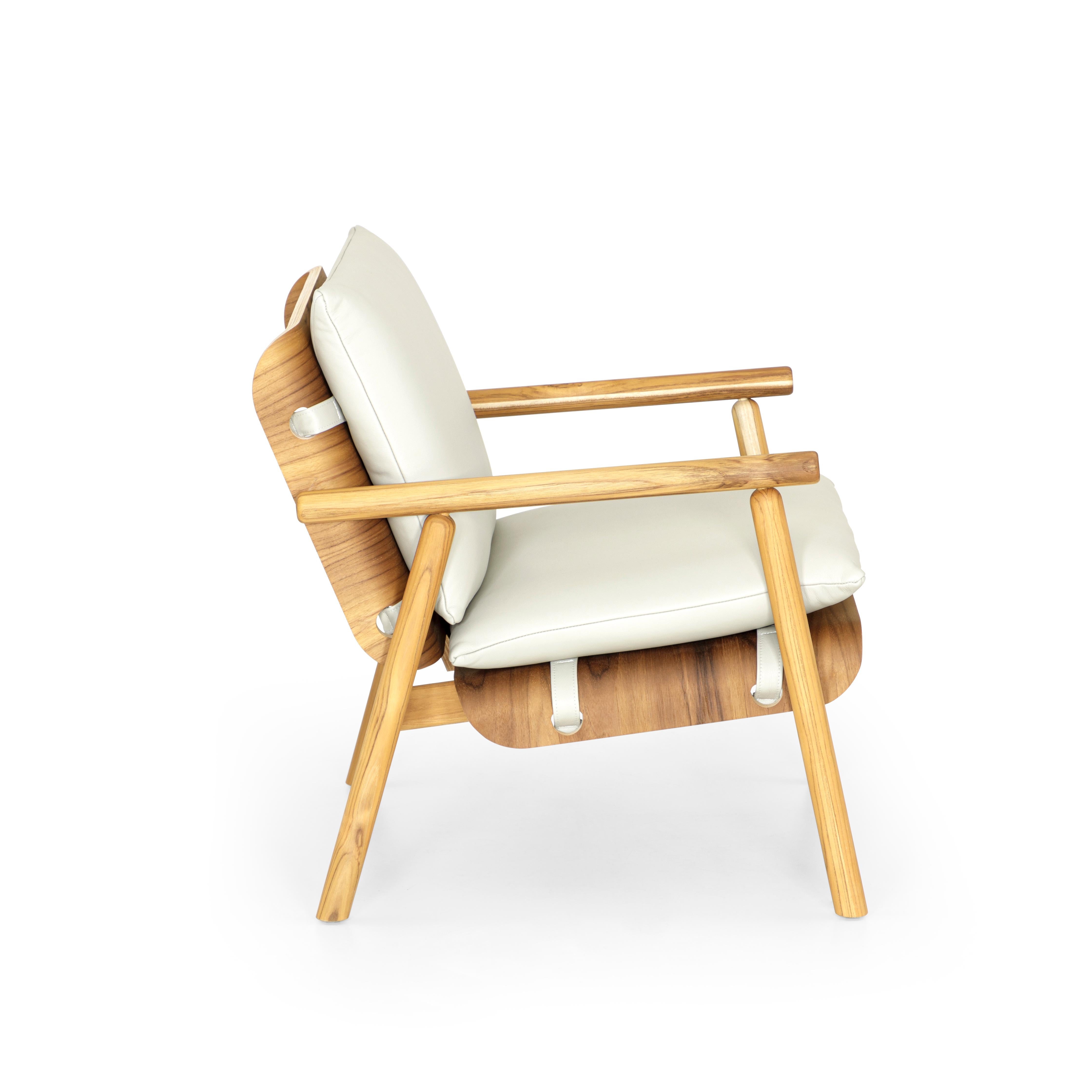 The Tai armchair has a lot going on but in a very simplistic way with the beautiful wood frame in a teak finish and its off-white leather cushions. The unique 
