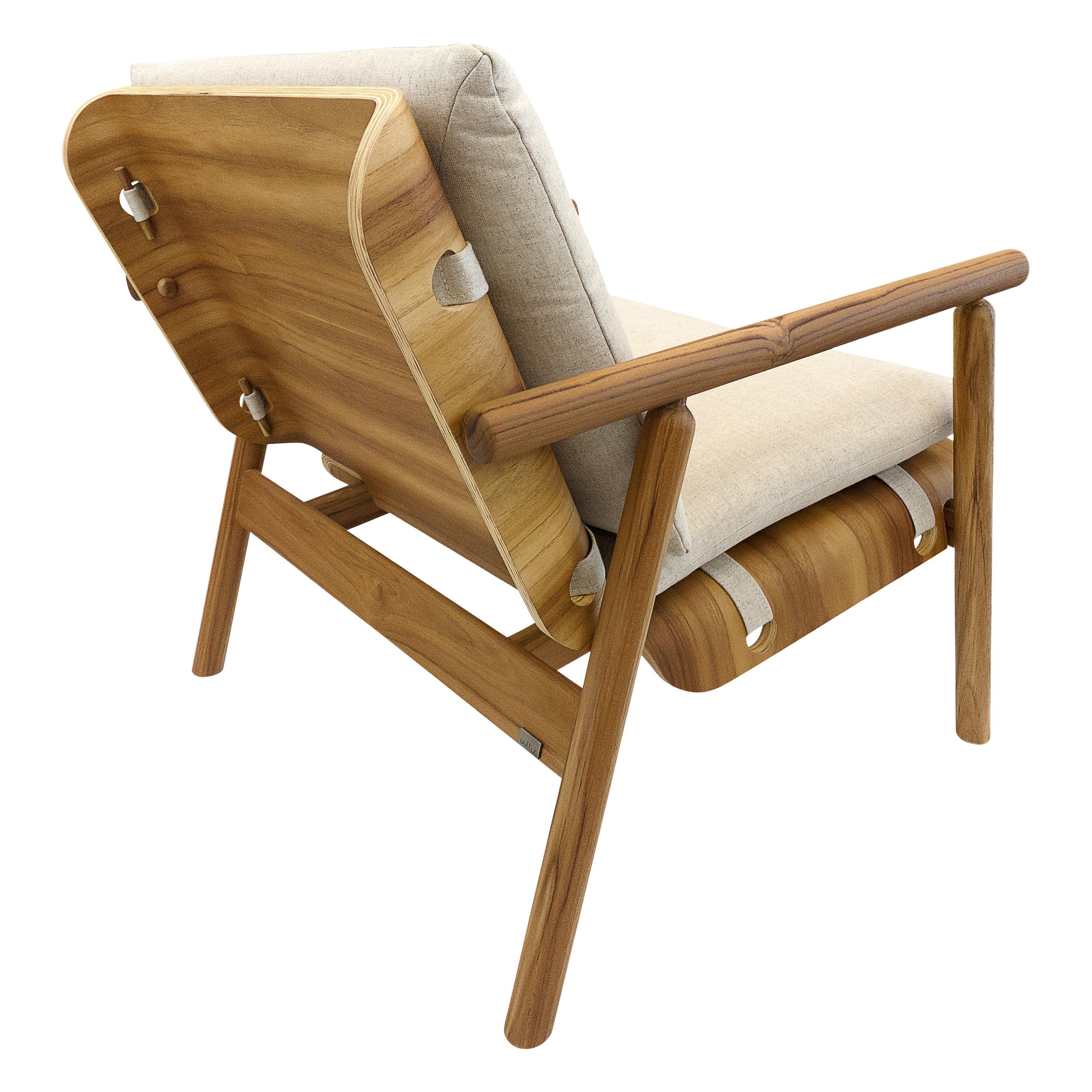 The Tai armchair has a lot going on but in a very simplistic way with the beautiful wood frame in a teak finish and its light beige fabric cushions. The unique 