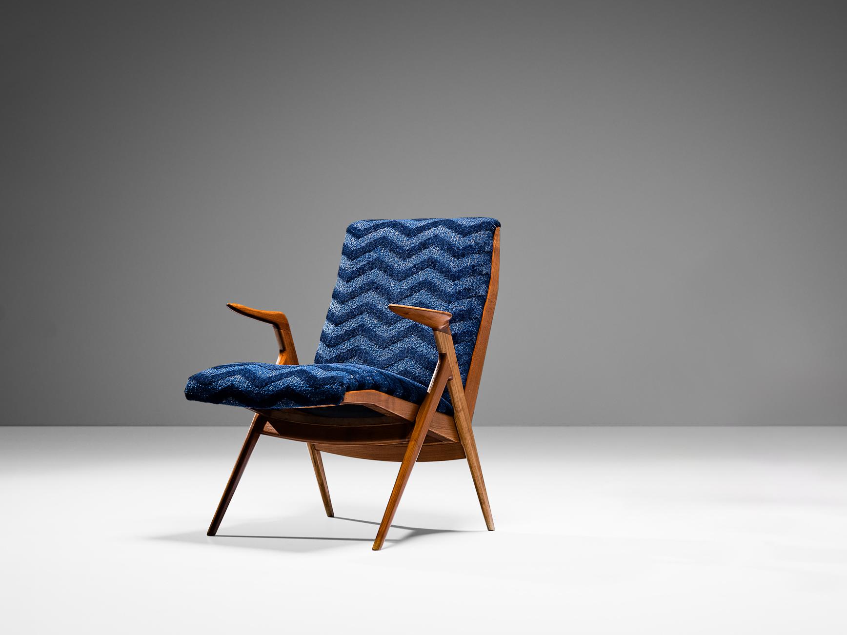 Taichiro Nakay (Nakai) for La Permanente Mobili La Permanente Mobili Cantù, armchair, cherry, reupholstered in Evolution 21 - Toscane Blue - 12, Italy, 1955

Taichiro Nakay is an incredibly talented Japanese designer who is mostly known for his