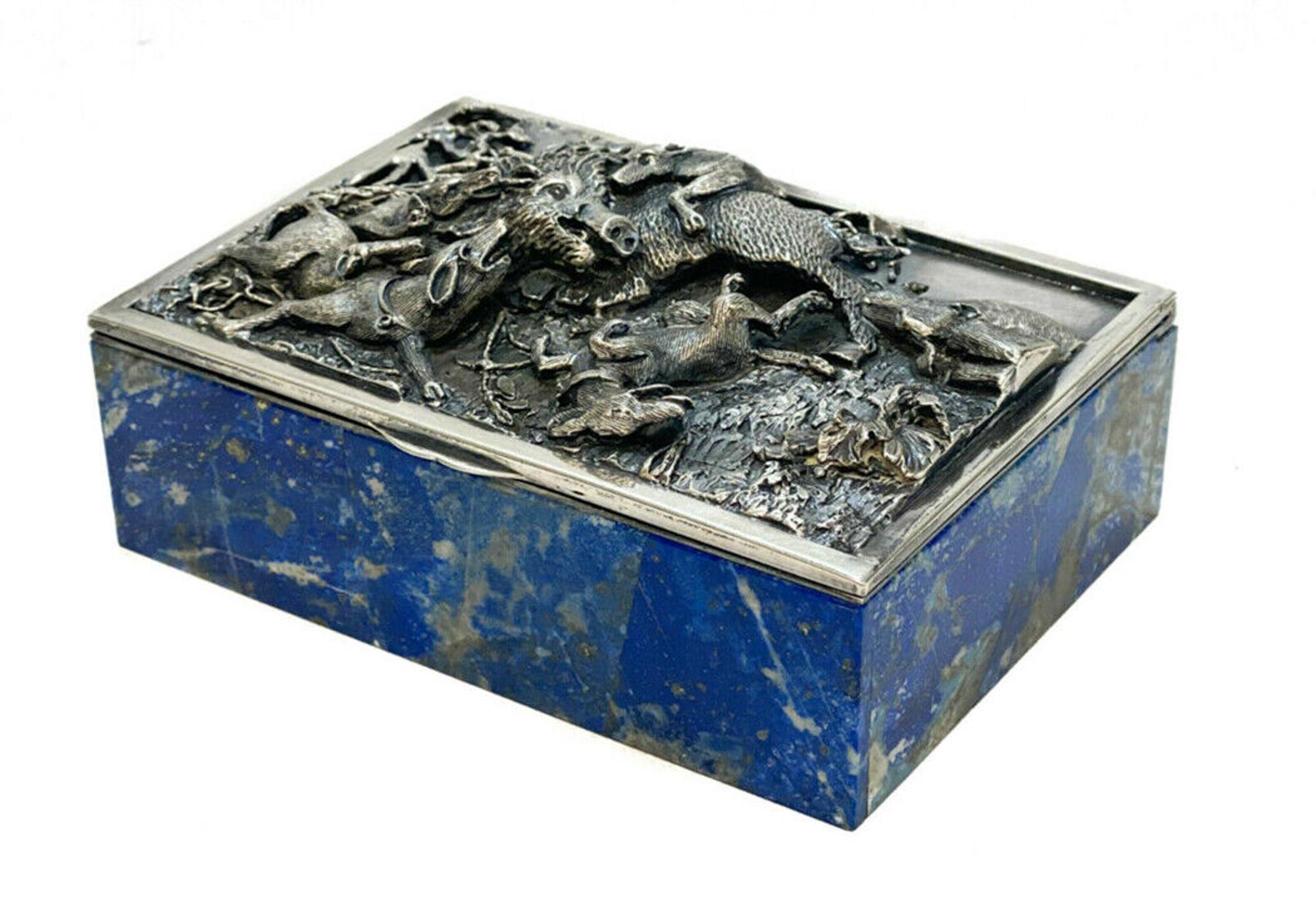  Taillan Adriano for Dunhill 800 silver lapis lazuli & white  quartz  cigarette  box, circa 1970.800 silver cover lid and mounts with a finely detailed high relief boar hunting scene to the central image. Lapis Lazuli to the walls and white quartz