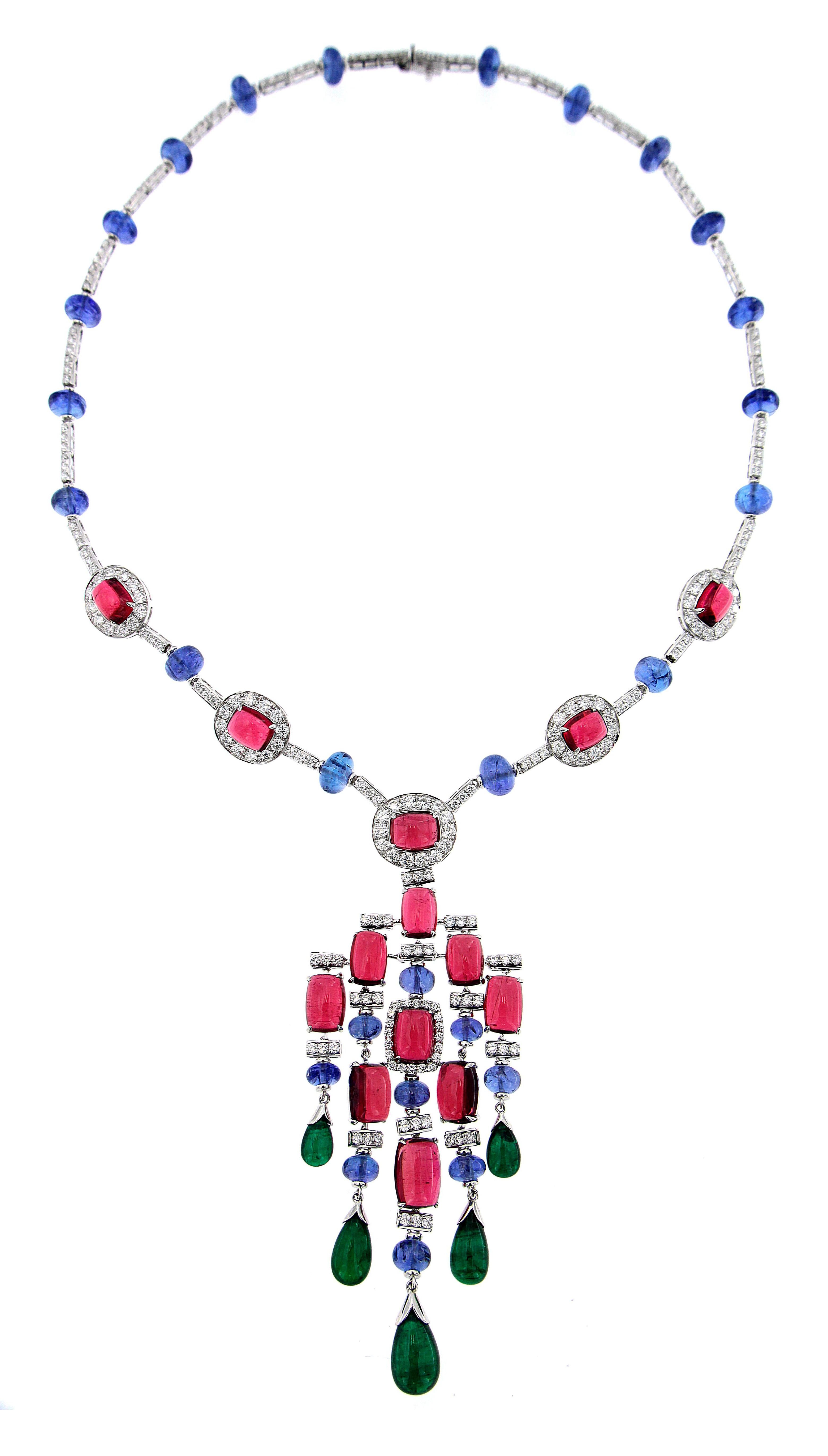 Tailor Made 18 Karat White Gold, Diamond And Multi Gem Stone Necklace 
Necklace:	
Diamonds of approximately 6.990 carats, emeralds of approximately 13.480 carats and semi-precious stones of approximately 92.810 carats   mounted on 18 karat white