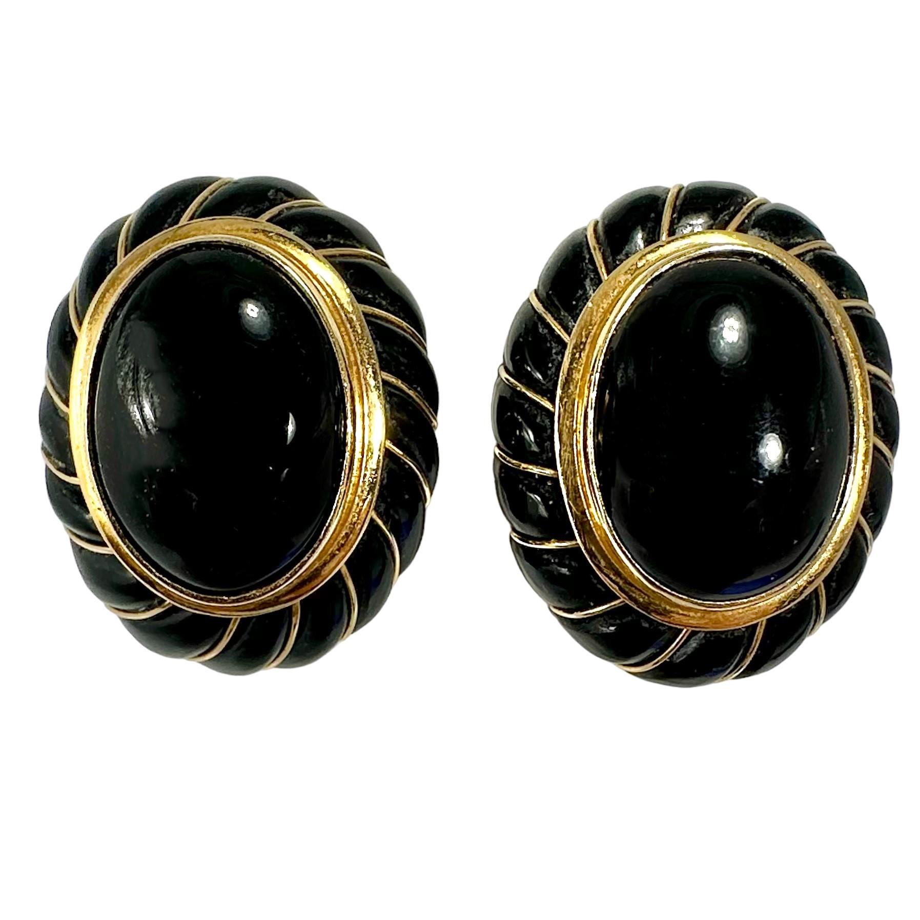 This highly detailed pair of onyx and gold earrings by MAZ are ideal for daytime wear. At 1 inch long by 3/4 inch wide, they are mid-sized, not too large and not too small. A bezel set onyx cabochon measuring 5/8 inch by 1 /2 inch is the
