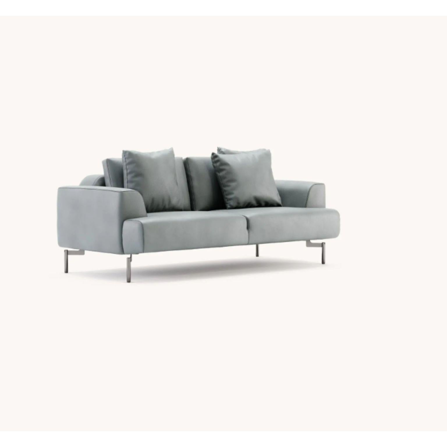 Taís 2 seats sofa by Domkapa
Materials: Natural leather (Desna Polvere), polished stainless steel. 
Dimensions: W 190 x D 95 x H 88 cm.
Also available in different materials. 
with 3 pillows included in the same fabric as the structure(50x50