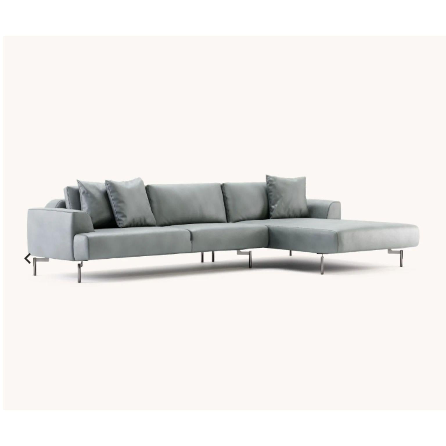 Taís Chaise sofa by Domkapa
Materials: Natural leather (Desna Polvere), polished stainless steel. 
Dimensions: W 321 x D 185 x H 88 cm.
Also available in different materials.
with 3 pillows included in the same fabric as the structure(50x50