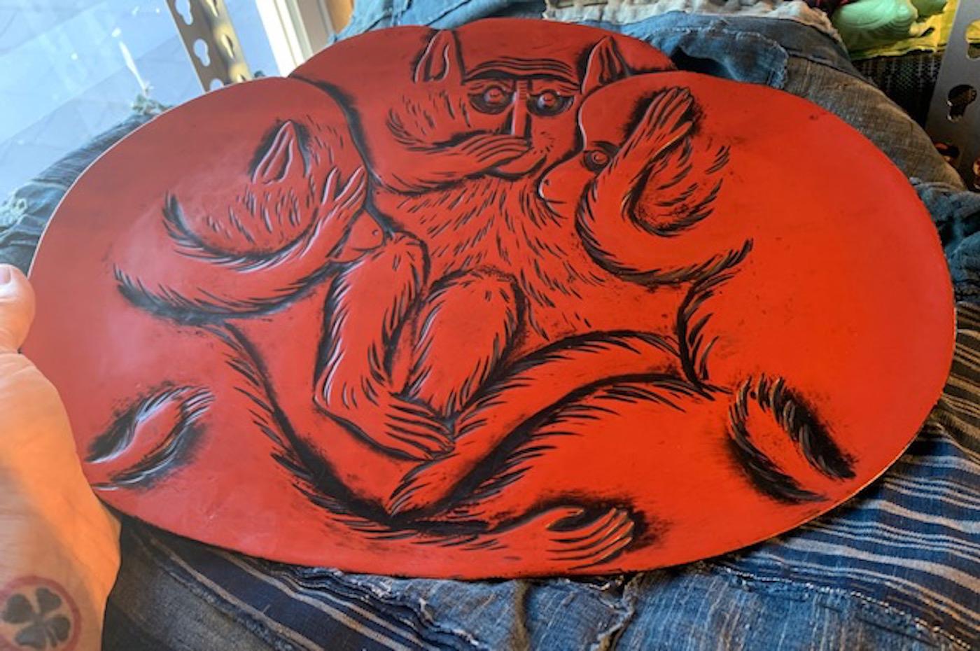 This Kamakura-bori wooden platter is delightfully carved and then lacquered in multiple layers of color. The red and black and platter depicts the three wise monkeys. Mizaru, covering his eyes, sees no evil; Kikazaru, covers his ears, hears no evil;