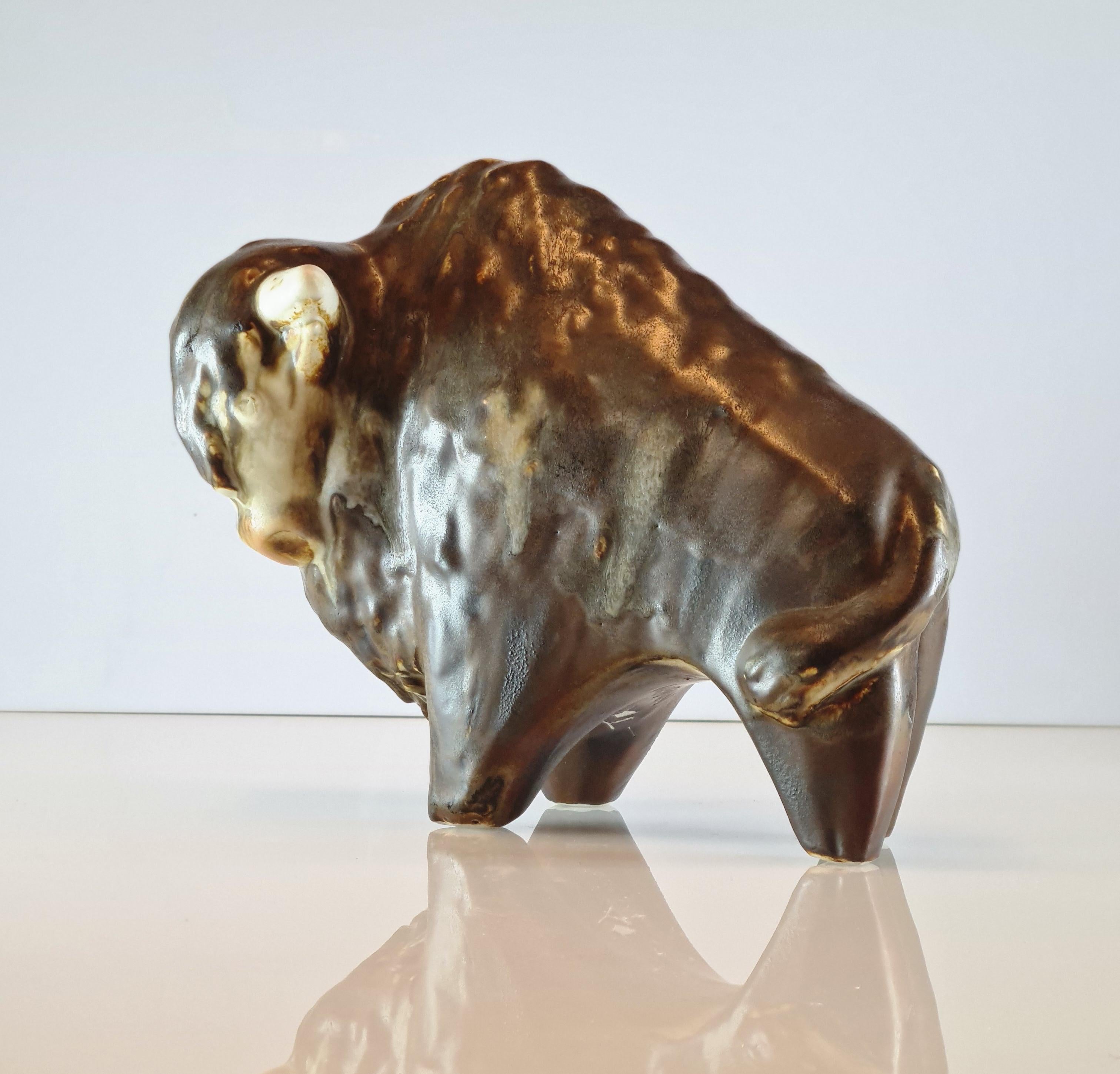 A beautiful and large ceramic bison figurine by the renowned Finnish ceramic artist and designer Taisto Kaasinen for Arabia. The figurine is signed TK and Arabia and is in a beautiful condition.

Not only a collector´s item for ceramic or figurine