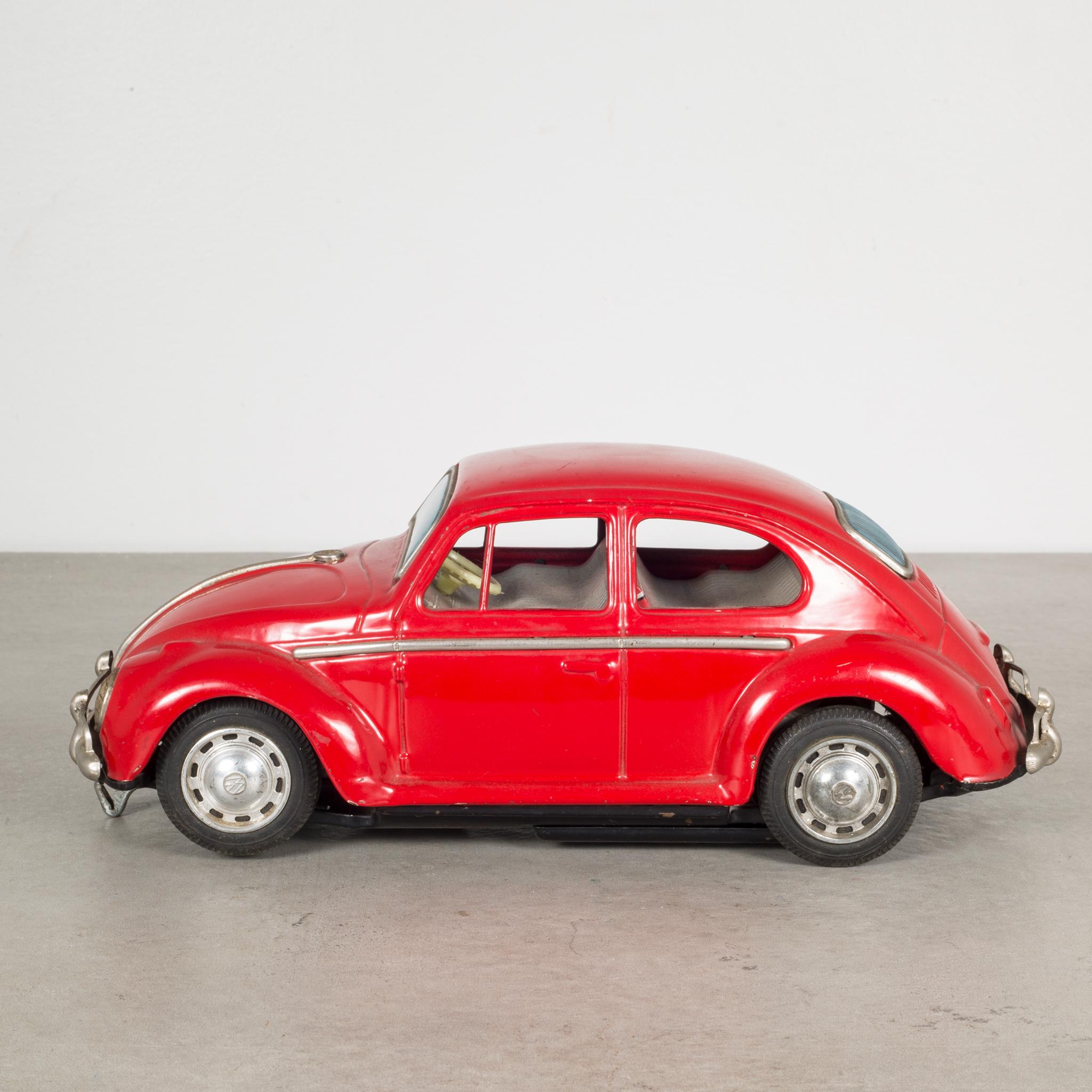 About:

This is a VW Beetle tin toy with rubber tires and original Taiyo Japan maker's mark. This toy does not operate.

Creator: Taiyo, Japan.
Date of manufacture: circa 1960s.
Materials and techniques: Tin, Rubber, Plastic.
 Condition: