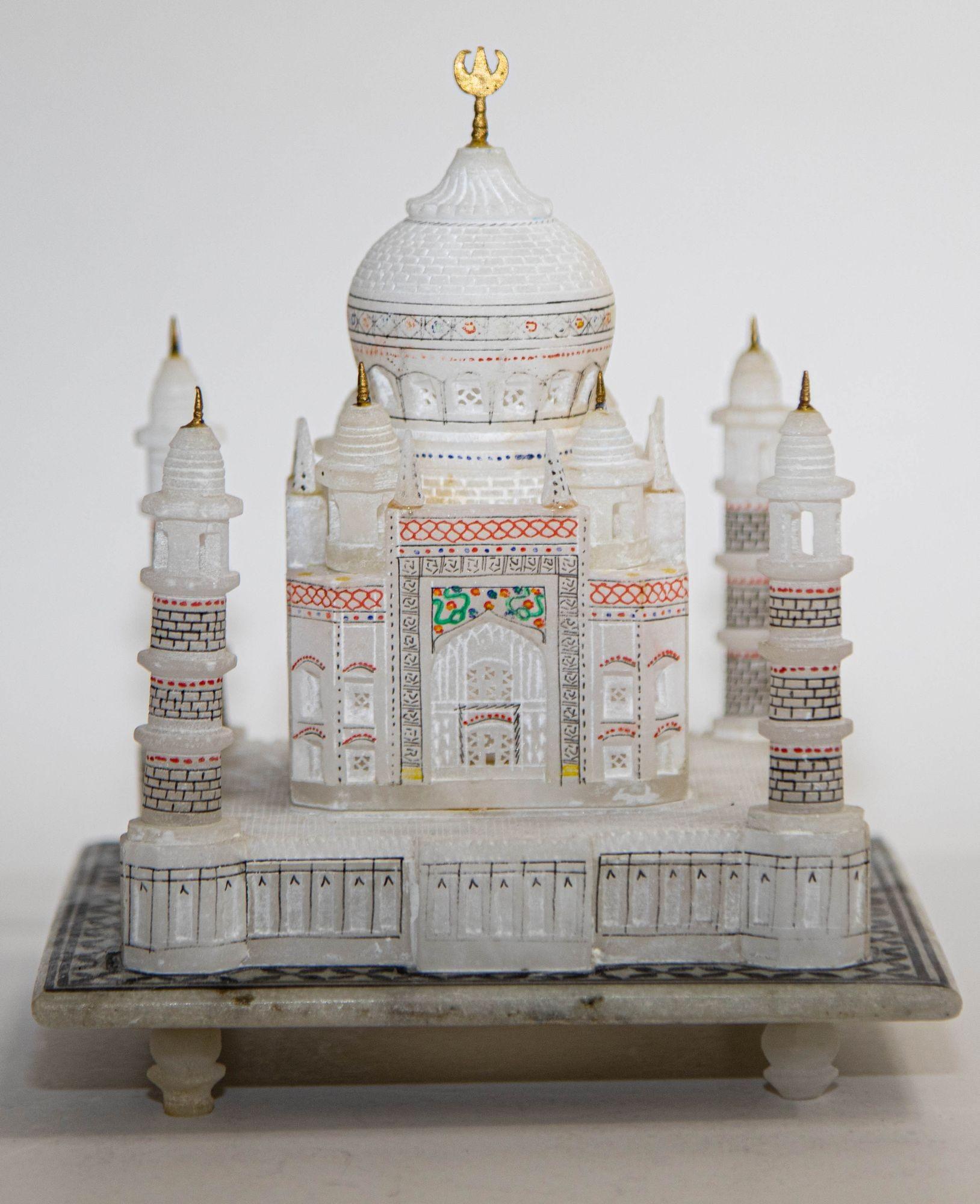 Vintage Taj Mahal white marble hand-crafted collectible architectural miniature model.
Handmade replica or miniature of the original Taj Mahal situated in India and popularly known as symbol of love.
A finely Taj Mahal replica hand-made from white