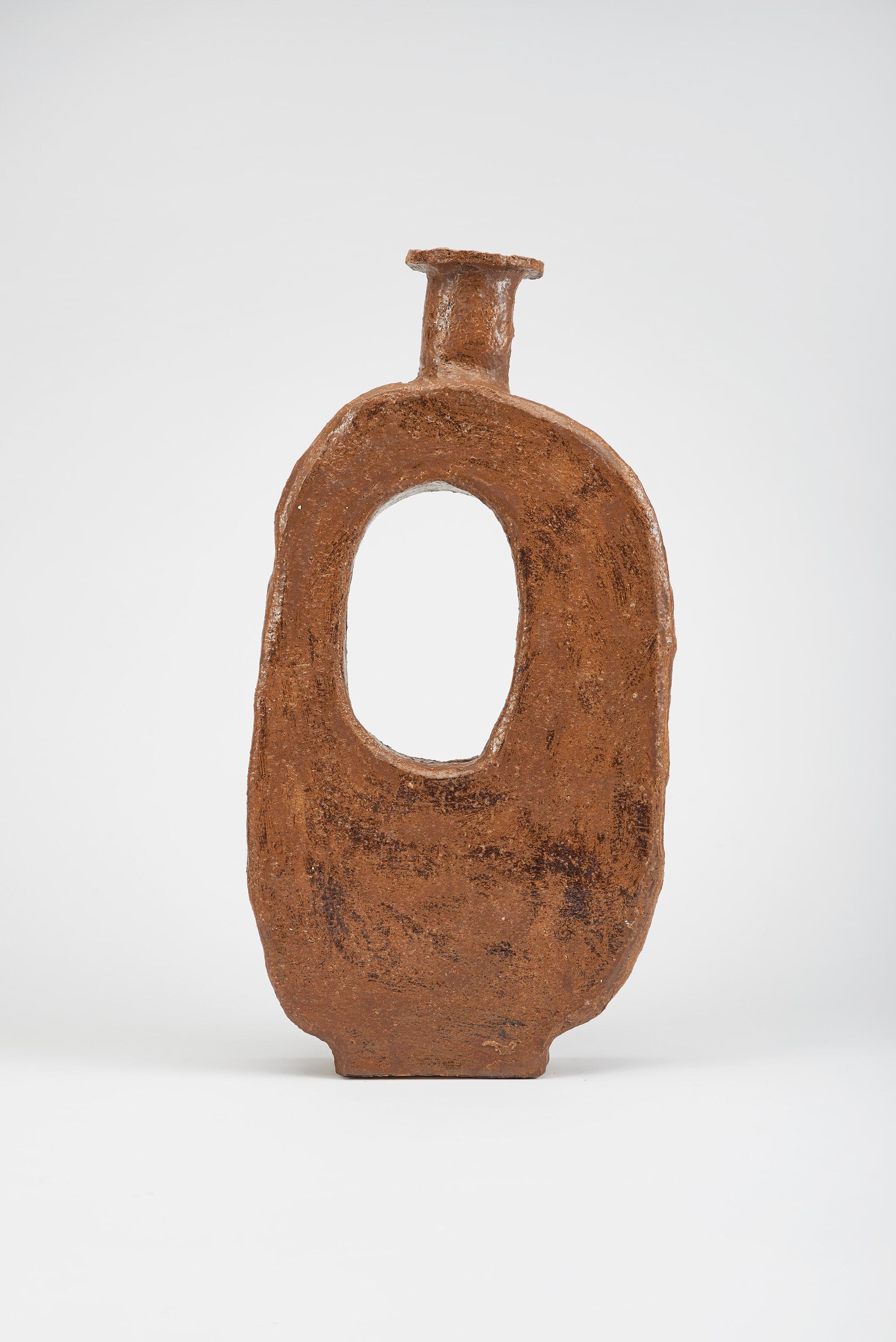 Taju Large Vase by Willem Van Hooff
Dimensions: W 42 x D 10 x H 63 cm (Dimensions may vary as pieces are hand-made and might present slight variations in sizes)
Material: Glazed Ceramics

Core is a serie of vessels. Inspired by prehistoric african