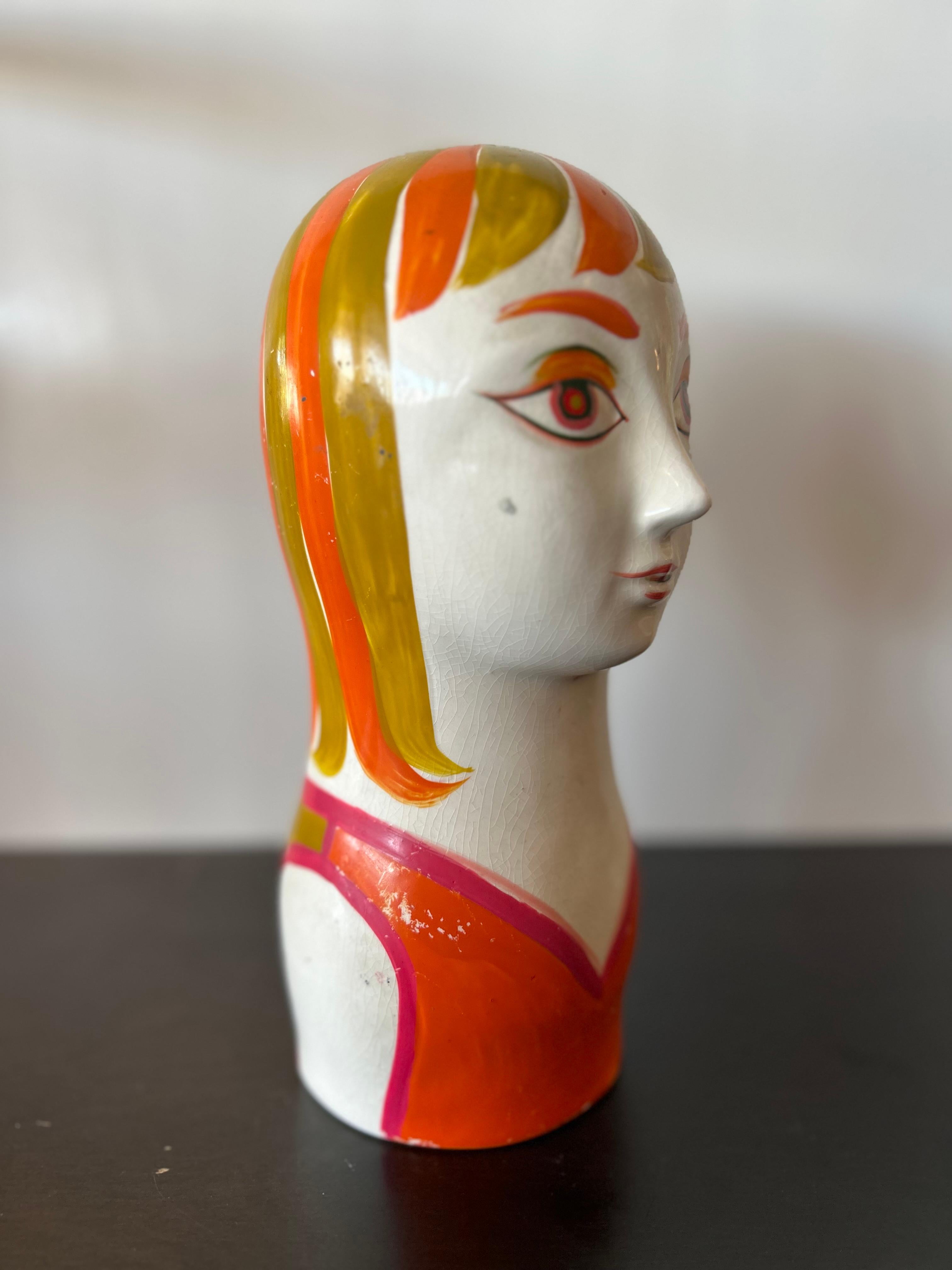 Retro 60's ceramic girl piggy bank or sculpture in the Big Eyes-style. Slight wear to some of the hand painted glazing.