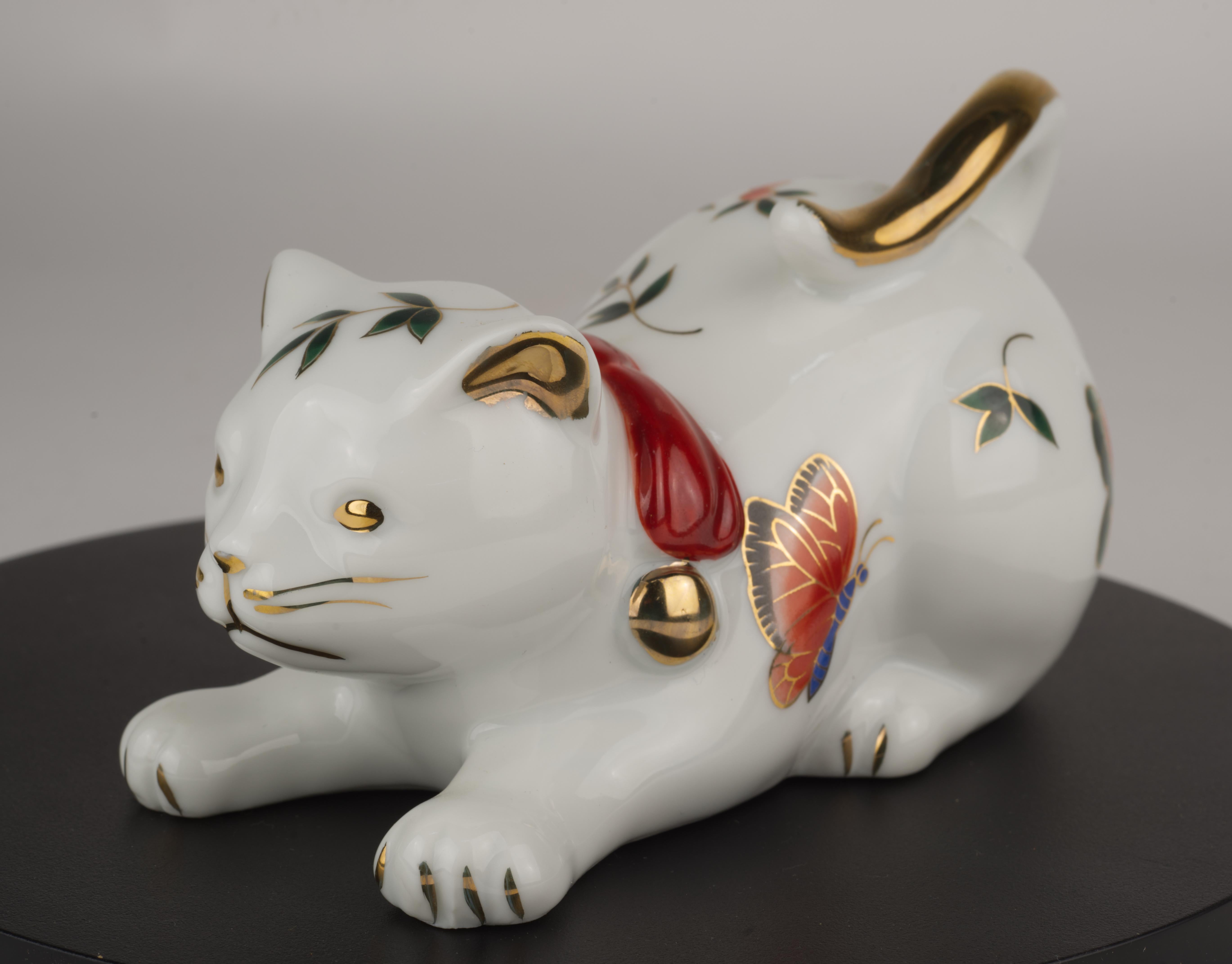 Japanese Takahashi Porcelain Playing Cat Figurine Hand-decorated with Butterflies For Sale