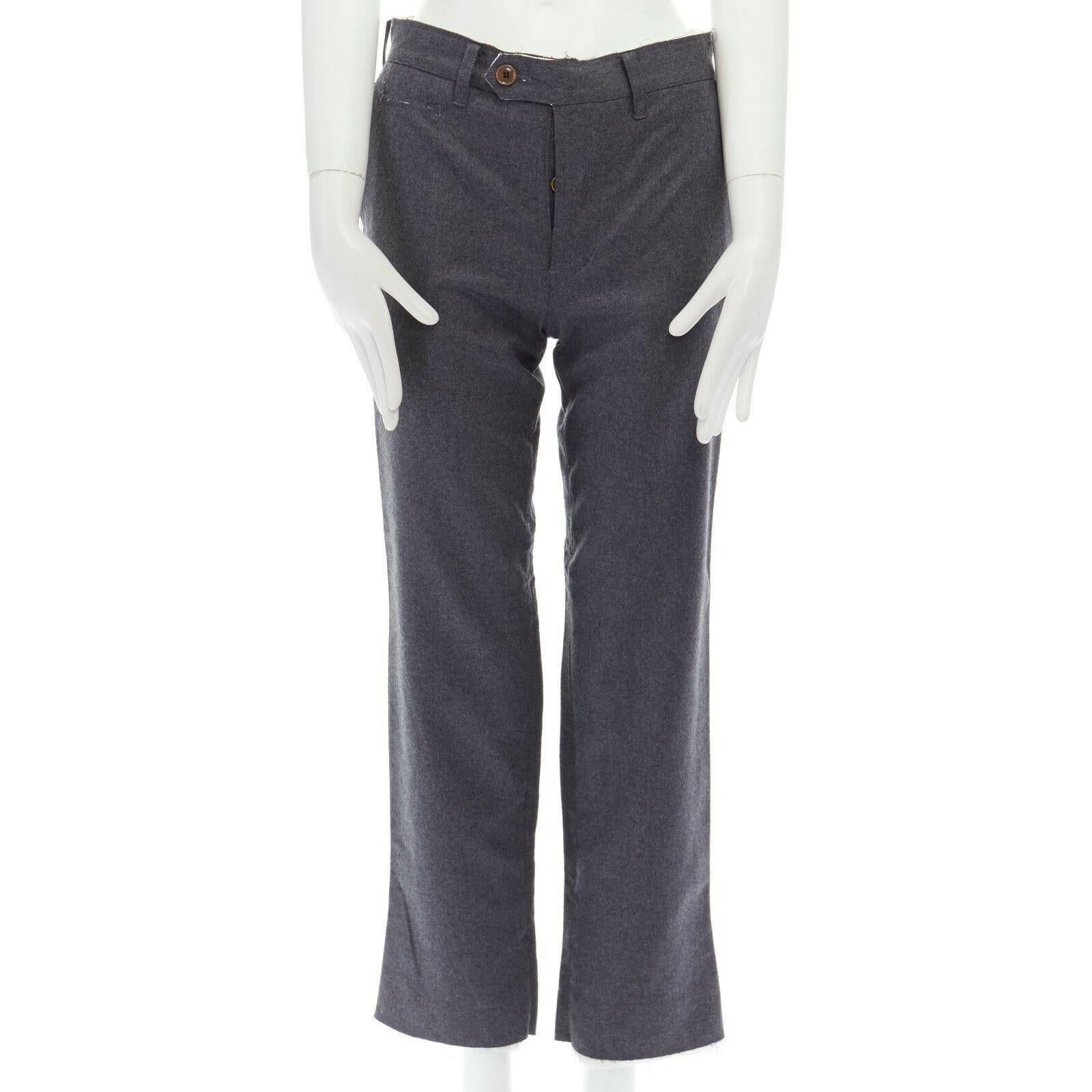TAKAHIROMIYASHITA THE SOLOIST 100% wool grey frayed unfinished hem pants IT44 
Reference: SANG/A00028 
Brand: The Soloist 
Material: Wool 
Color: Grey 
Pattern: Solid 
Extra Detail: 100% wool. Grey. Pull tab button fly. Belt loop detail. Tonal