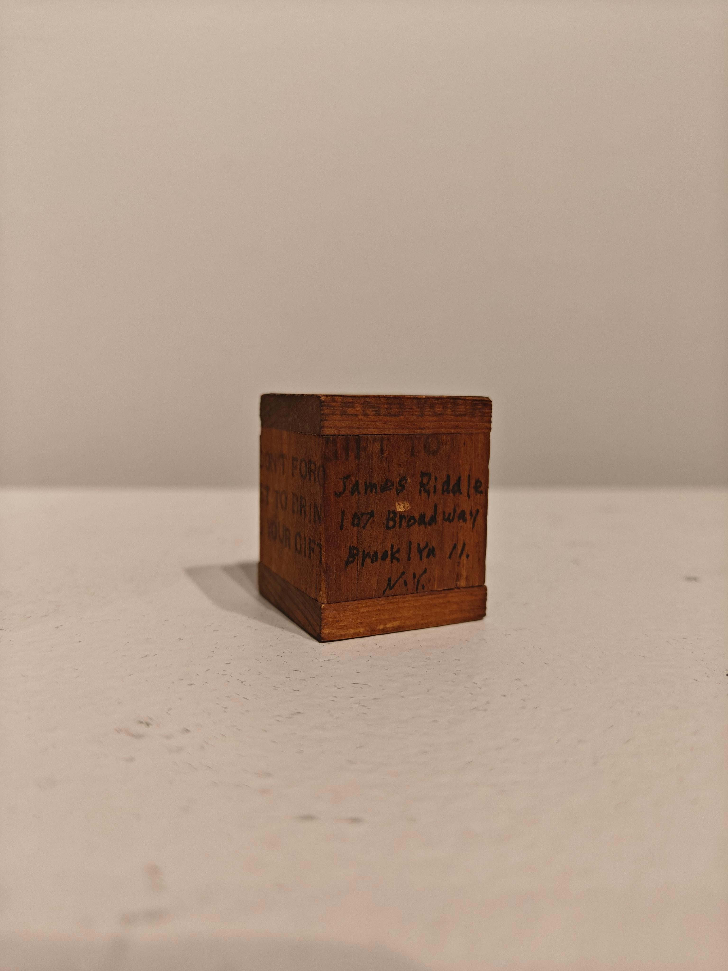 Takako Saito
Secret Santa , 1965
Stamped inscribed in pen recipients name
Wood construction
1 1/2 x 1 1/4 x 1 1/4 inches


Takako Saito is a Japanese artist closely associated with Fluxus, the international collective of avant-garde artists that was