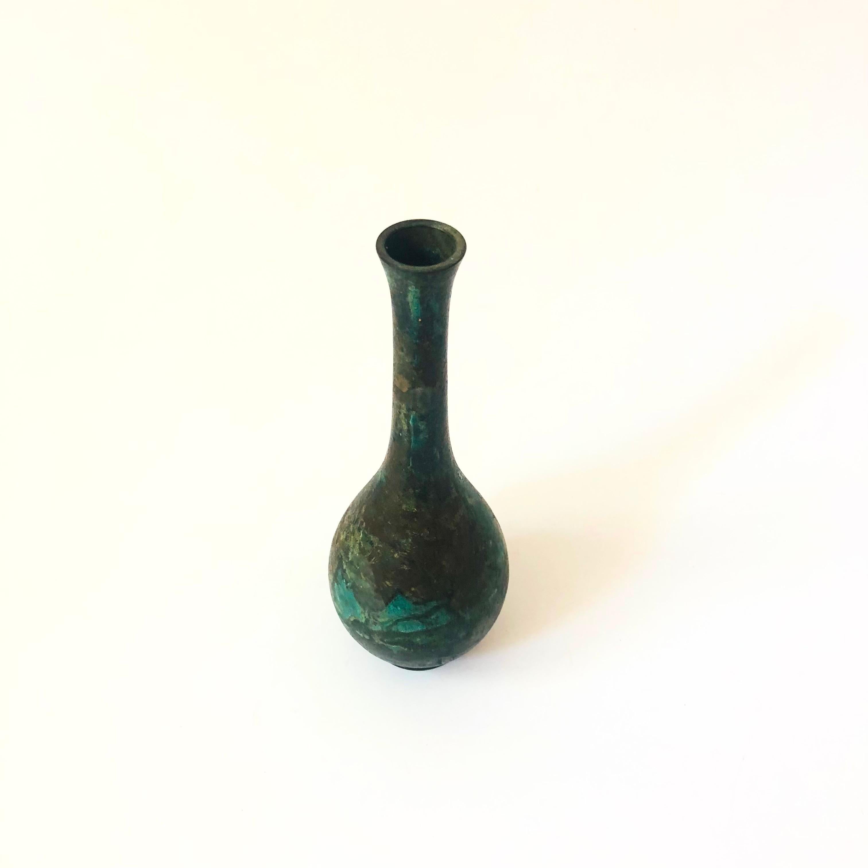A vintage Japanese Takaoka Doki verdigris bronze vase. Beautiful variation between the green and bronze organic patinated finish.


