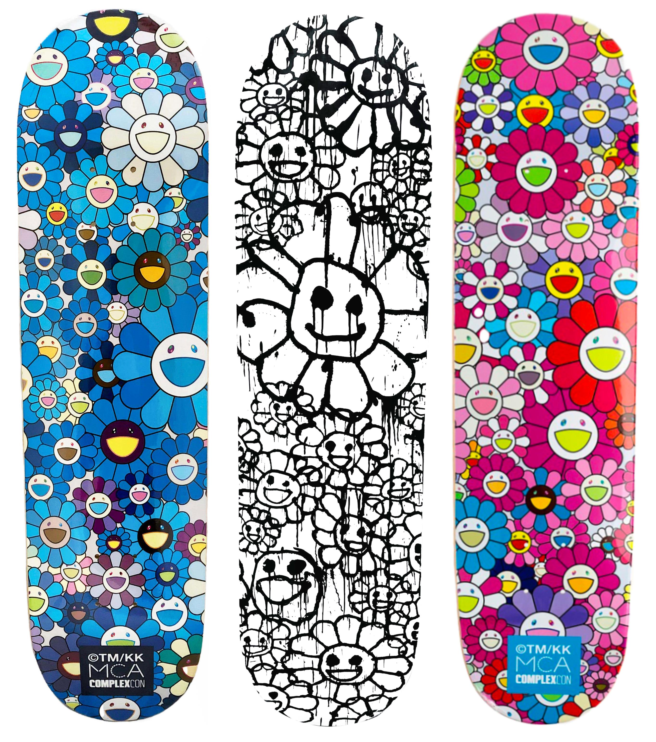 Takashi Murakami Flowers Skateboard Decks: set of 3 works:
Vibrant Takashi Murakami wall art produced as a limited series in conjunction with the 2017 Murakami exhibit: The Octopus Eats Its Own Leg, MCA Chicago (blue & pink) & 2021 (black & white