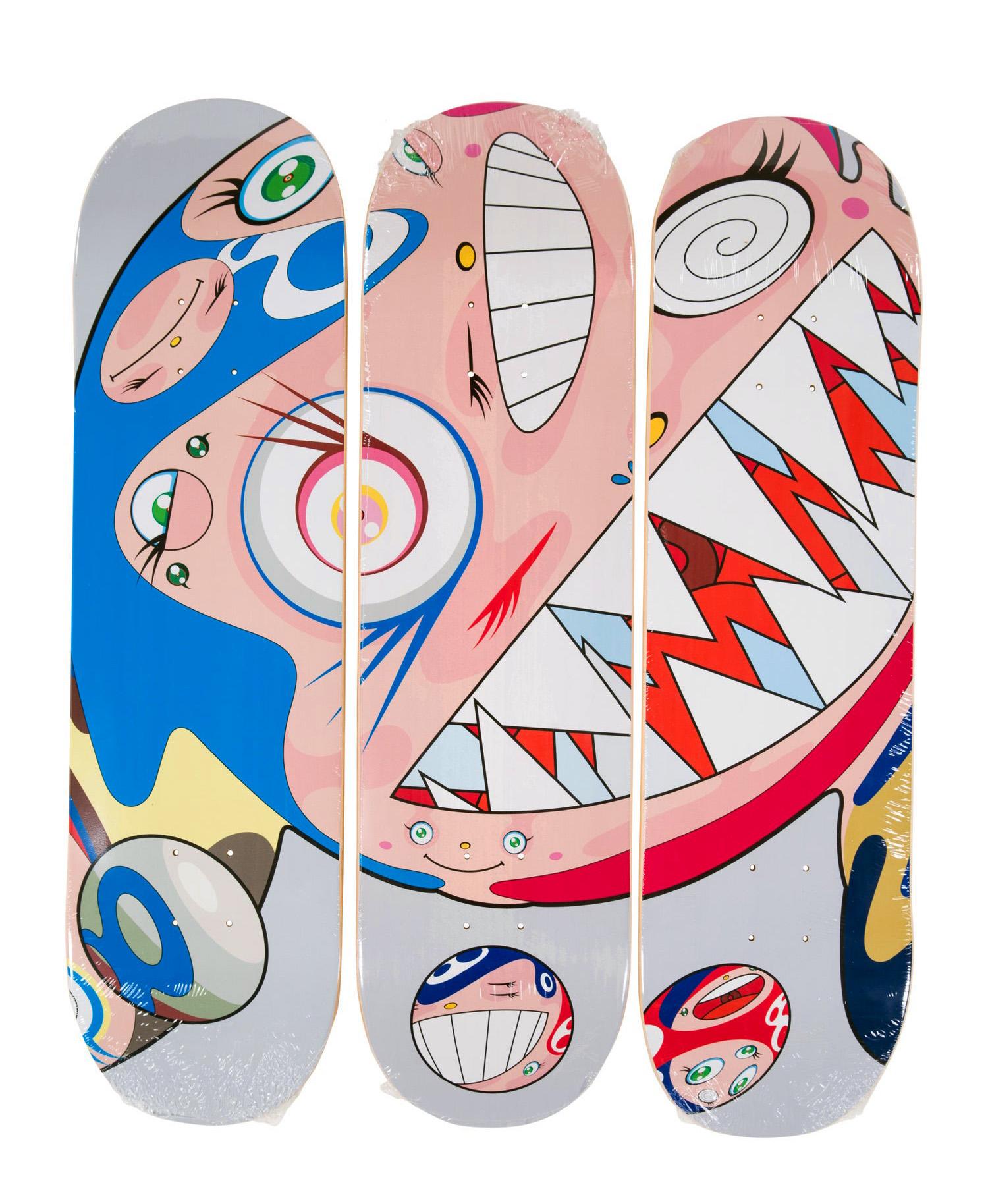 Takashi Murakami DOB Skateboard Deck Triptych 2018:
A highly decorative Takashi Murakami skateboard set/triptych that makes for vibrant one of a kind wall-art that hangs with ease. The works feature Takashi Murakami’s Mr. DOB figure spread across