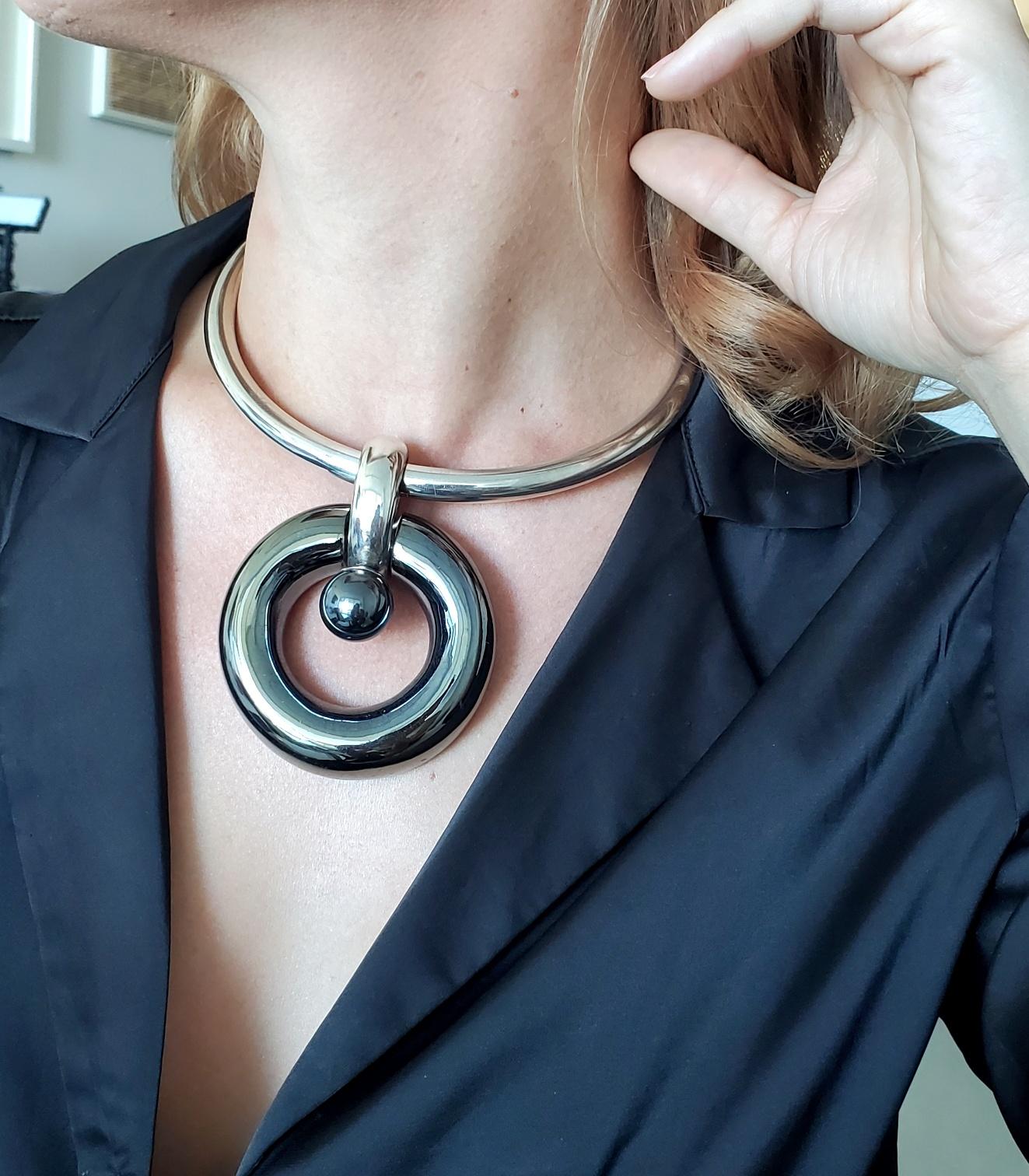 Modern necklace designed by Takashi Wada (1938-).

An impressive ultra modern sculptural necklace, created by the Japanese designer and silversmith Takashi Wada, back in the 1980. This beautiful torque necklace has been crafted with purist geometric