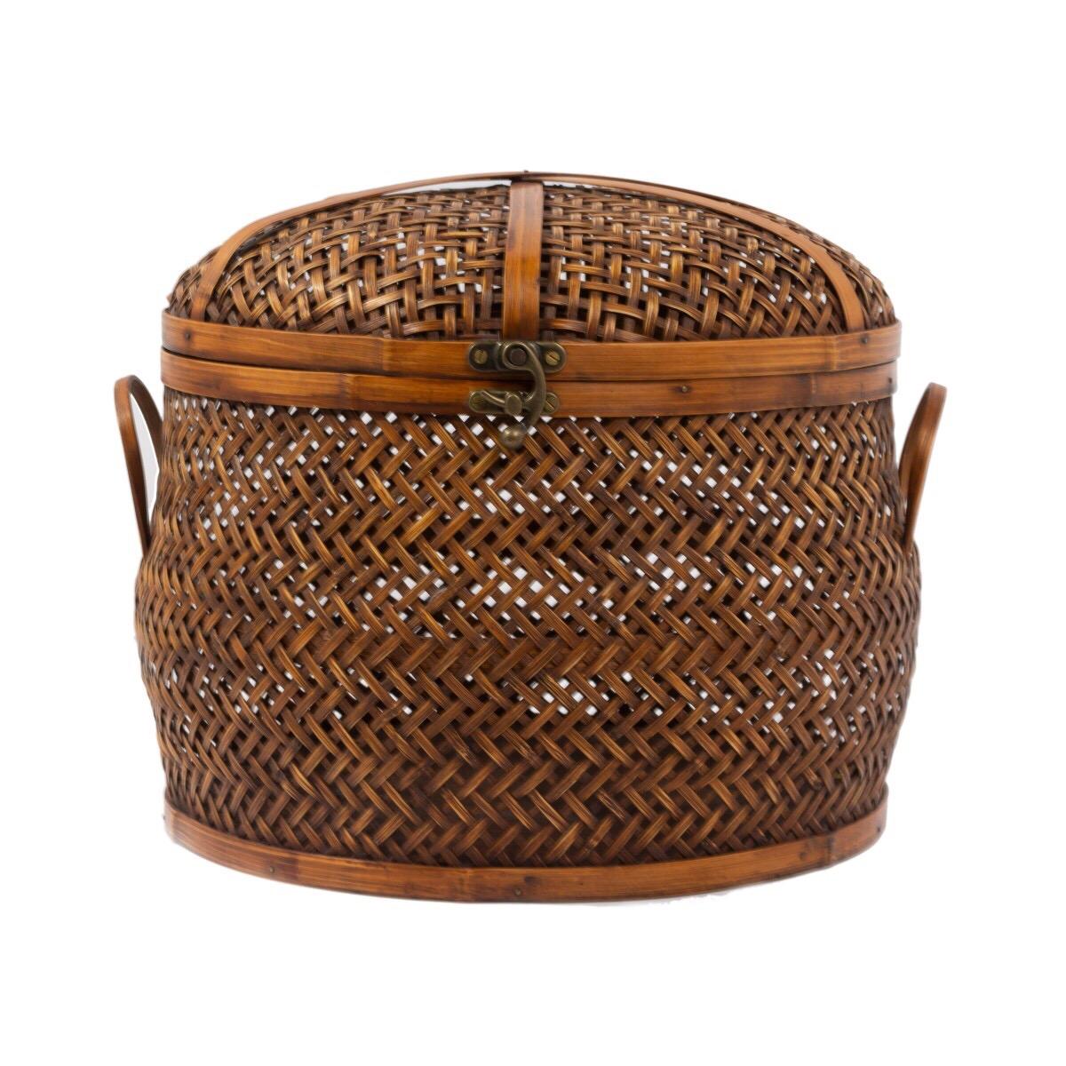 A vintage woven rattan and bamboo basket with attached lid by Takashimaya. Japan, circa 2000.

The famed upscale Japanese retailer Takashimaya was a venerable boutique on Manhattan's Fifth Avenue tht cloed in 2010. Their collection of apparel and
